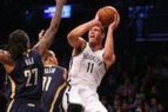 Feb 3, 2016; Brooklyn, NY, USA;  Indiana Pacers guard Monta Ellis (11) fouls Brooklyn Nets center Brook Lopez (11) during the first quarter at Barclays Center. Mandatory Credit: Anthony Gruppuso-USA TODAY Sports