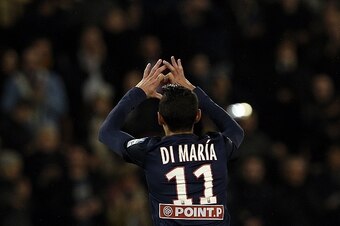 Paris Saint-Germain's Argentinian forward Angel Di Maria celebrates after scoring a goal during the French League Cup football match between Paris Saint-Germain (PSG) and Toulouse at the Parc des Princes stadium in Paris on January 27, 2016. / AFP / FRANC