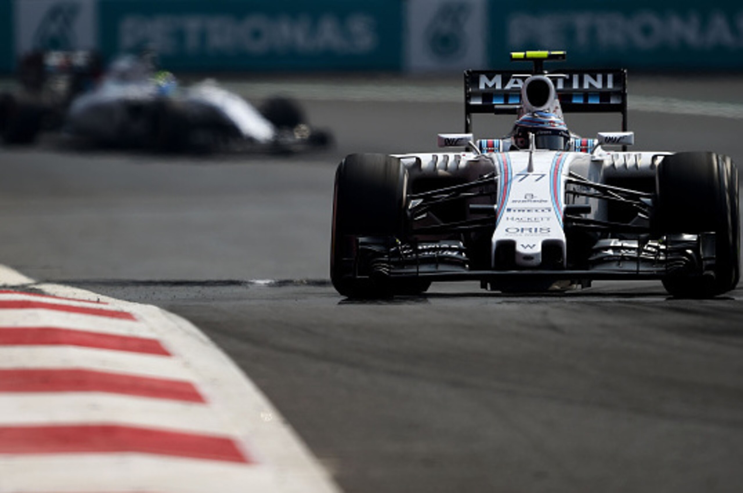 MEXICO CITY, MEXICO - NOVEMBER 01: Valtteri Bottas of Finland and Williams drives ahead of Felipe Massa of Brazil and Williams during the Formula One Grand Prix of Mexico at Autodromo Hermanos Rodriguez on November 1, 2015 in Mexico City, Mexico. (Photo MEXICO CITY, MEXICO - NOVEMBER 01: Valtteri Bottas of Finland and Williams drives ahead of Felipe Massa of Brazil and Williams during the Formula One Grand Prix of Mexico at Autodromo Hermanos Rodriguez on November 1, 2015 in Mexico City, Mexico. (Photo