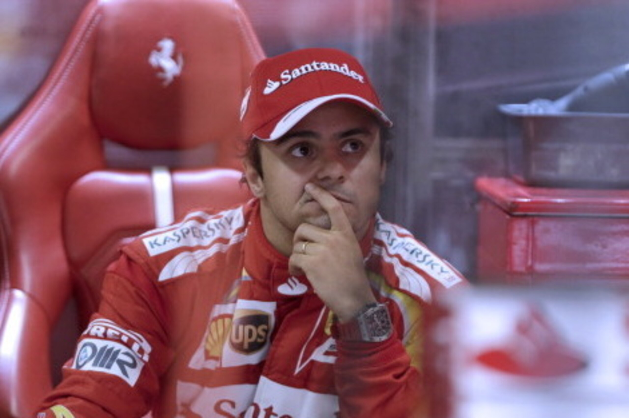 Brazilian Formula One driver Felipe Massa at Ferrari motor-racing gestures during a pause in the pit on November 22, 2013 during the free practices at the Interlagos racetrack in Sao Paulo, Brazil ahead of the Brazilian GP on Sunday. AFP PHOTO/MIGUEL SCHI Brazilian Formula One driver Felipe Massa at Ferrari motor-racing gestures during a pause in the pit on November 22, 2013 during the free practices at the Interlagos racetrack in Sao Paulo, Brazil ahead of the Brazilian GP on Sunday. AFP PHOTO/MIGUEL SCHI
