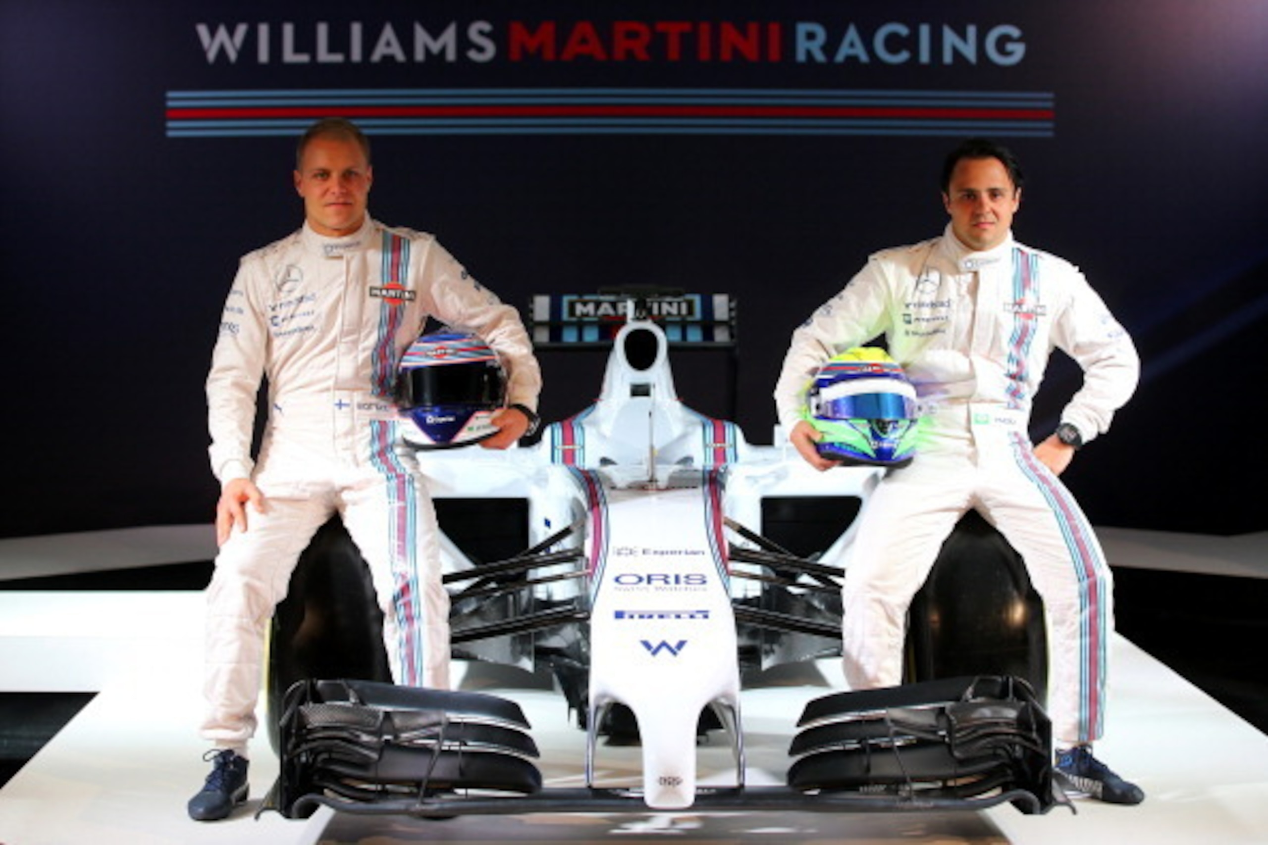 LONDON, ENGLAND - MARCH 06: Valtteri Bottas of Finland and Felipe Massa of Brazil pose with the Williams Martini Racing formula one car on March 6, 2014 in London, England. (Photo by Clive Rose/Getty Images) LONDON, ENGLAND - MARCH 06: Valtteri Bottas of Finland and Felipe Massa of Brazil pose with the Williams Martini Racing formula one car on March 6, 2014 in London, England. (Photo by Clive Rose/Getty Images)