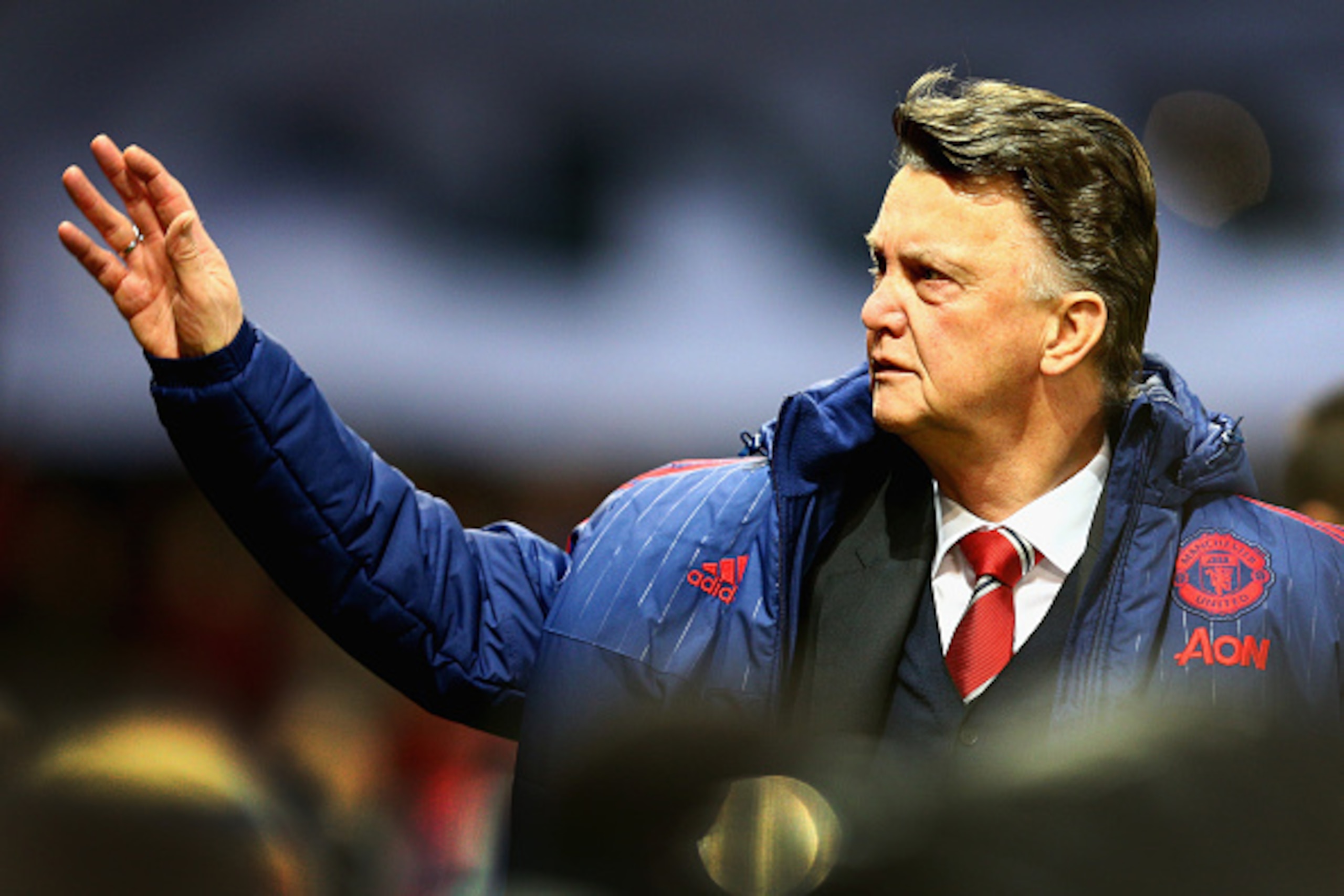 MANCHESTER, ENGLAND - FEBRUARY 02:  Louis van Gaal of Manchester United waves to the crowd before the Barclays Premier League match between Manchester United and Stoke City at Old Trafford on February 2, 2016 in Manchester, England.  (Photo by Clive Mason
