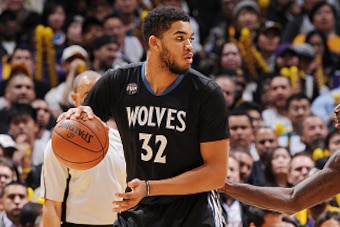LOS ANGELES, CA - FEBRUARY 2:  Karl-Anthony Towns #32 of the Minnesota Timberwolves handles the ball against the Los Angeles Lakers on February 2, 2016 at STAPLES Center in Los Angeles, California. NOTE TO USER: User expressly acknowledges and agrees that