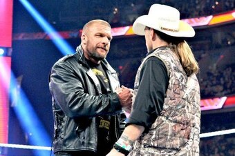 Triple H and Shawn Michaels share a moment on Raw.