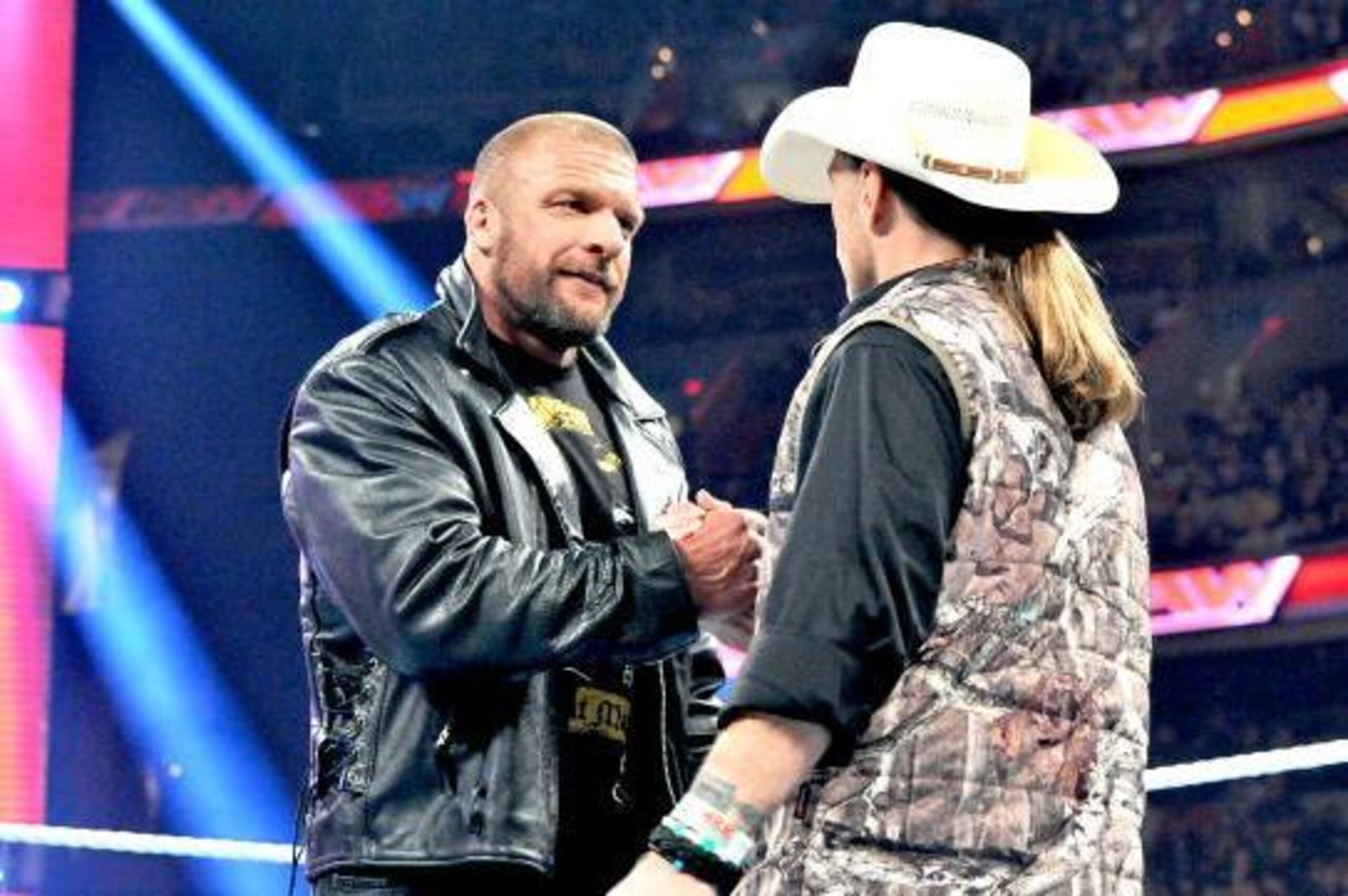 Triple H and Shawn Michaels share a moment on Raw.