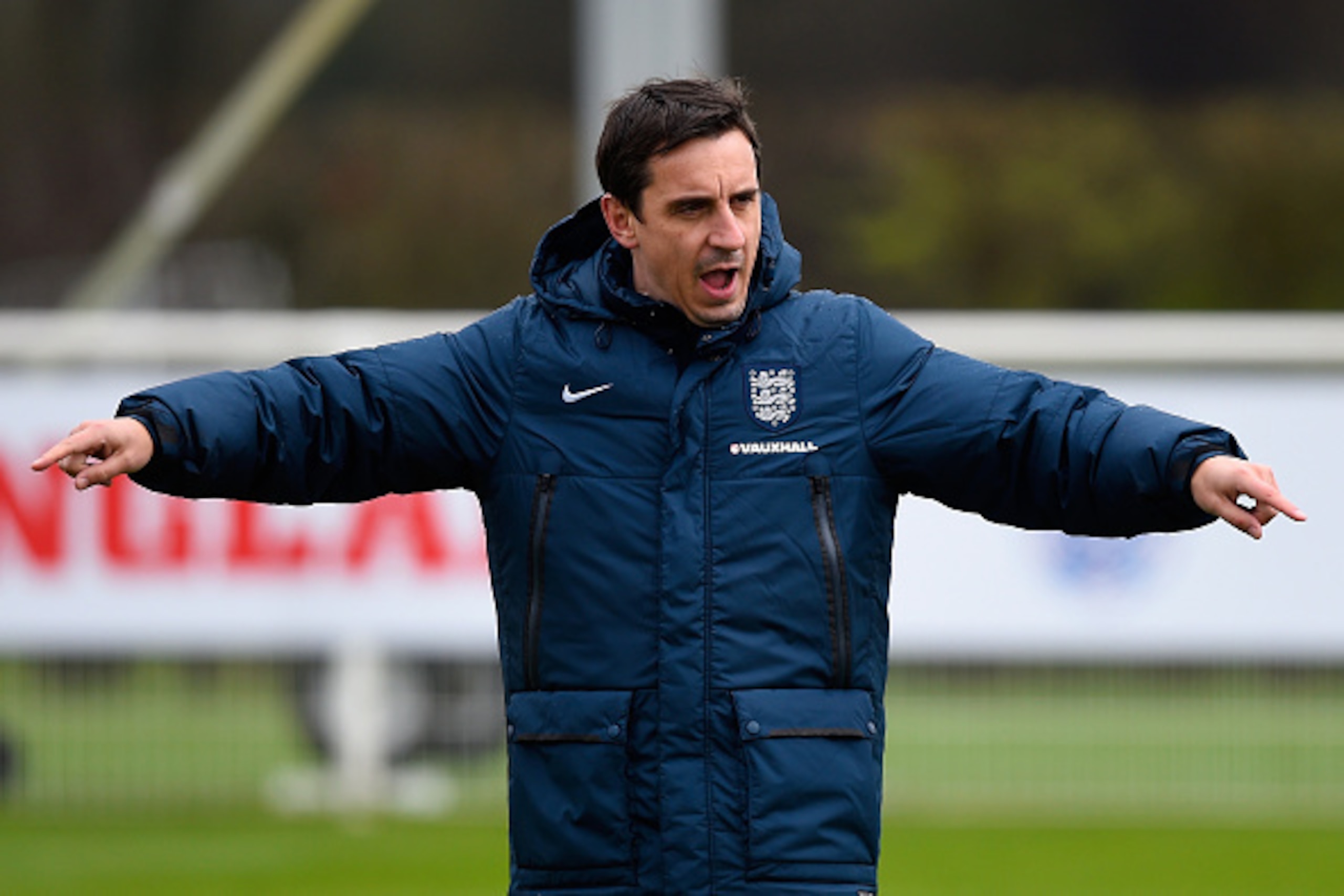 ENFIELD, ENGLAND - MARCH 26:  First Team Coach Gary Neville of England gestures during an England training session ahead of the Euro 2016 qualifier against Lithuania at Enfield Training Centre on March 26, 2015 in Enfield, England.  (Photo by Mike Hewitt/