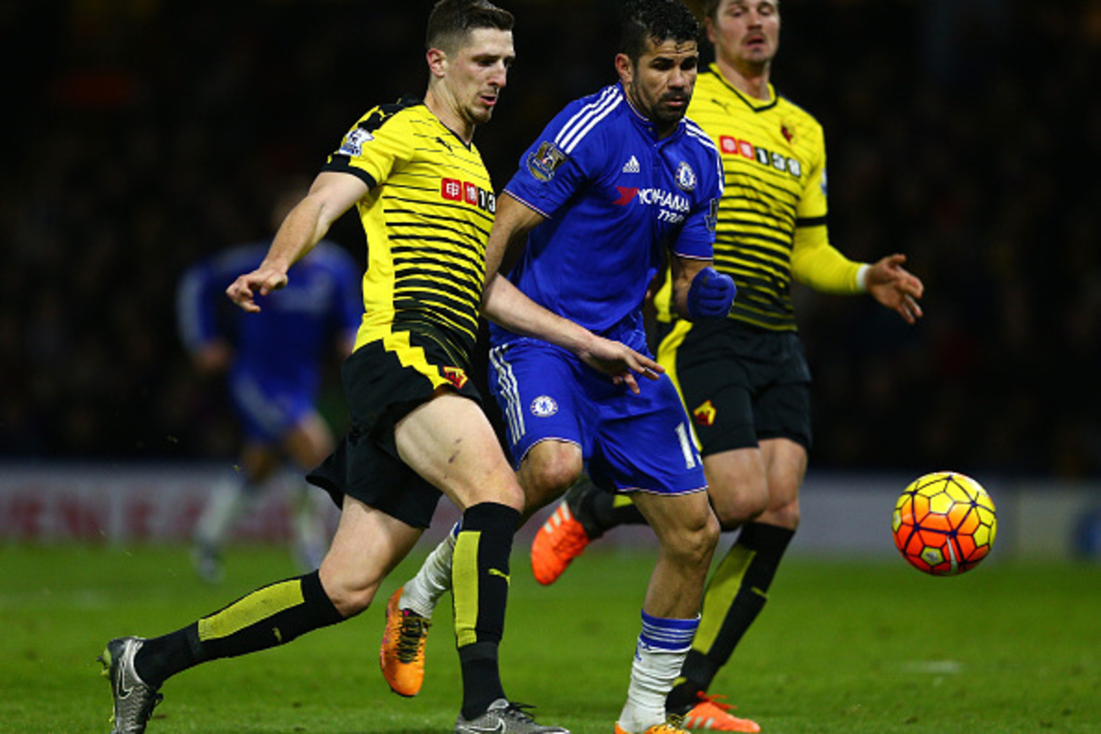 WATFORD, ENGLAND - FEBRUARY 03:  Diego Costa of Chelsea is challenged by Craig Cathcart of Watford during the Barclays Premier League match between Watford and Chelsea at Vicarage Road on February 3, 2016 in Watford, England.  (Photo by Clive Mason/Getty 