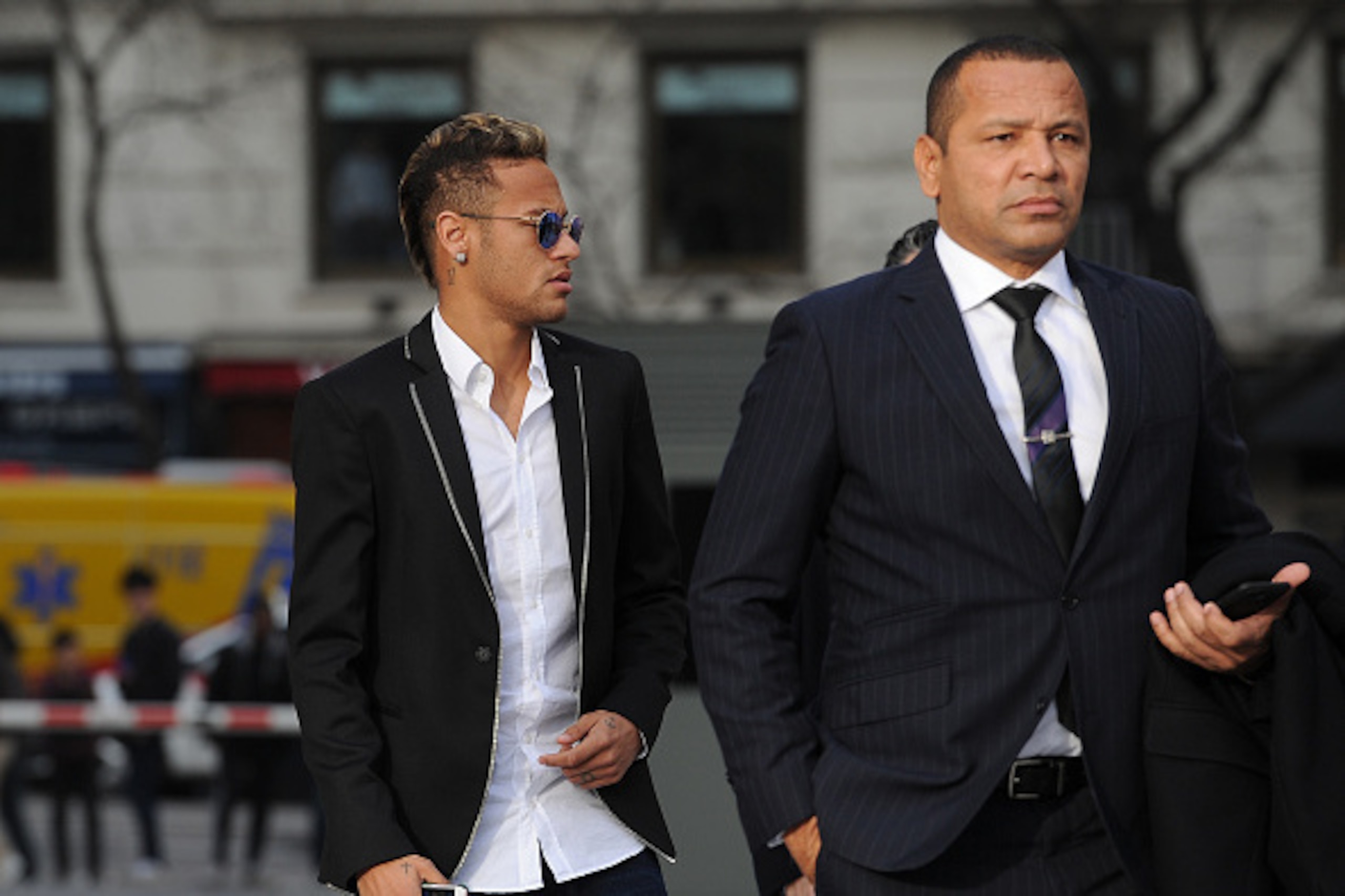 MADRID, SPAIN - FEBRUARY 02: Neymar of FC Barcelona arrives at the National Court accompanied with his father Neymar da Silva Santos on February 2, 2016 in Madrid, Spain. Neymar is due to give evidence in over allegations of corruption and fraud surround MADRID, SPAIN - FEBRUARY 02: Neymar of FC Barcelona arrives at the National Court accompanied with his father Neymar da Silva Santos on February 2, 2016 in Madrid, Spain. Neymar is due to give evidence in over allegations of corruption and fraud surround