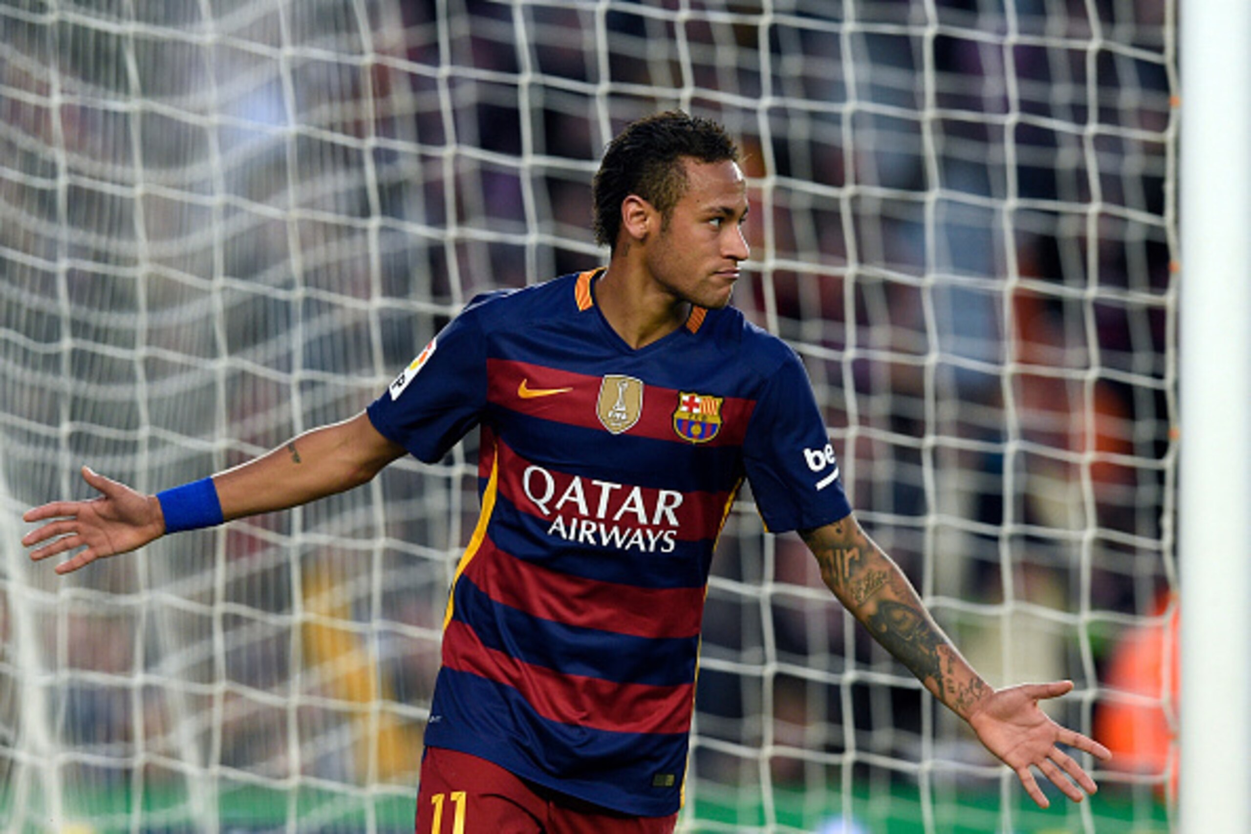 Barcelona's Brazilian forward Neymar celebrates a goal during the Spanish league football match FC Barcelona vs Granada CF at the Camp Nou stadium in Barcelona on January 9, 2016. AFP PHOTO / LLUIS GENE / AFP / LLUIS GENE (Photo credit should read Barcelona's Brazilian forward Neymar celebrates a goal during the Spanish league football match FC Barcelona vs Granada CF at the Camp Nou stadium in Barcelona on January 9, 2016. AFP PHOTO / LLUIS GENE / AFP / LLUIS GENE (Photo credit should read