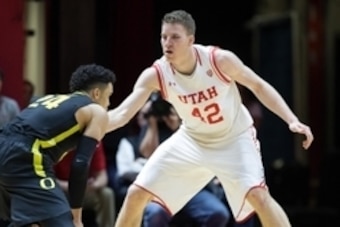 Jan 14, 2016; Salt Lake City, UT, USA; Oregon Ducks forward Dillon Brooks (24) holds the ball while defended by Utah Utes forward Jakob Poeltl (42) during the second half at Jon M. Huntsman Center. Mandatory Credit: Rob Gray-USA TODAY Sports