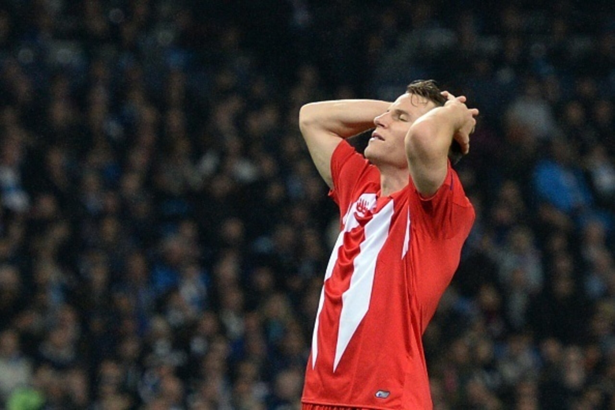 Sevilla's French forward Kevin Gameiro reacts after missing a header during a UEFA Champions league Group D football match between Manchester City and Sevilla at the Etihad Stadium in Manchester, north west England on October 21, 2015.       AFP PHOTO / O