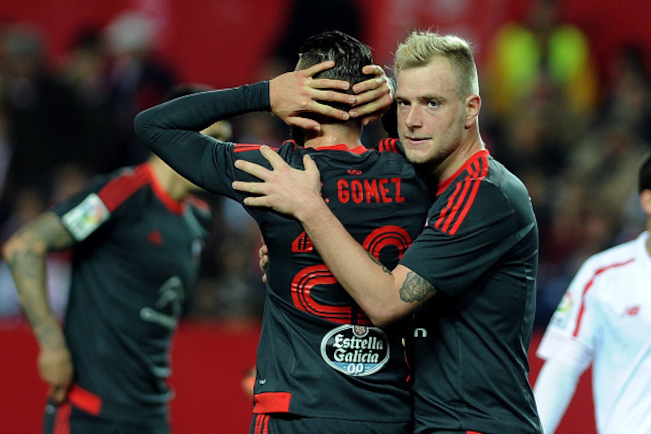 Celta Vigo's defender Sergi Gomez (L) and Celta Vigo's Danish defender Daniel Wass react after missing a goal opportunity during the Spanish Copa del Rey (King's Cup) semifinal first leg football match Sevilla FC vs RC Celta de Vigo at the Ramon Sanchez P