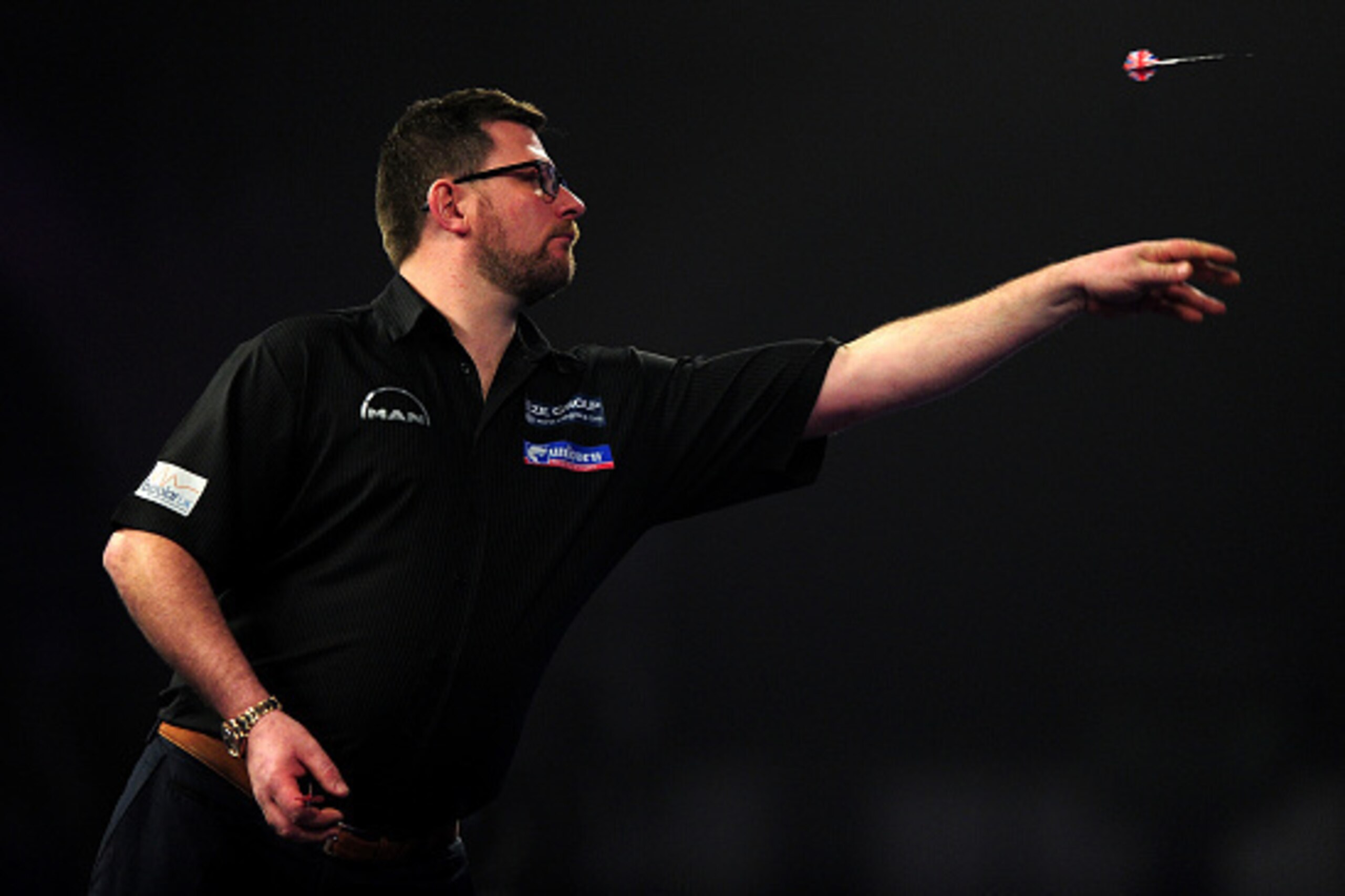 LONDON, ENGLAND - JANUARY 01:  James Wade of England throws during his quarter final match against Gary Anderson of Scotland during Day Thirteen of the 2016 William Hill PDC World Darts Championships at Alexandra Palace on January 1, 2016 in London, Engla