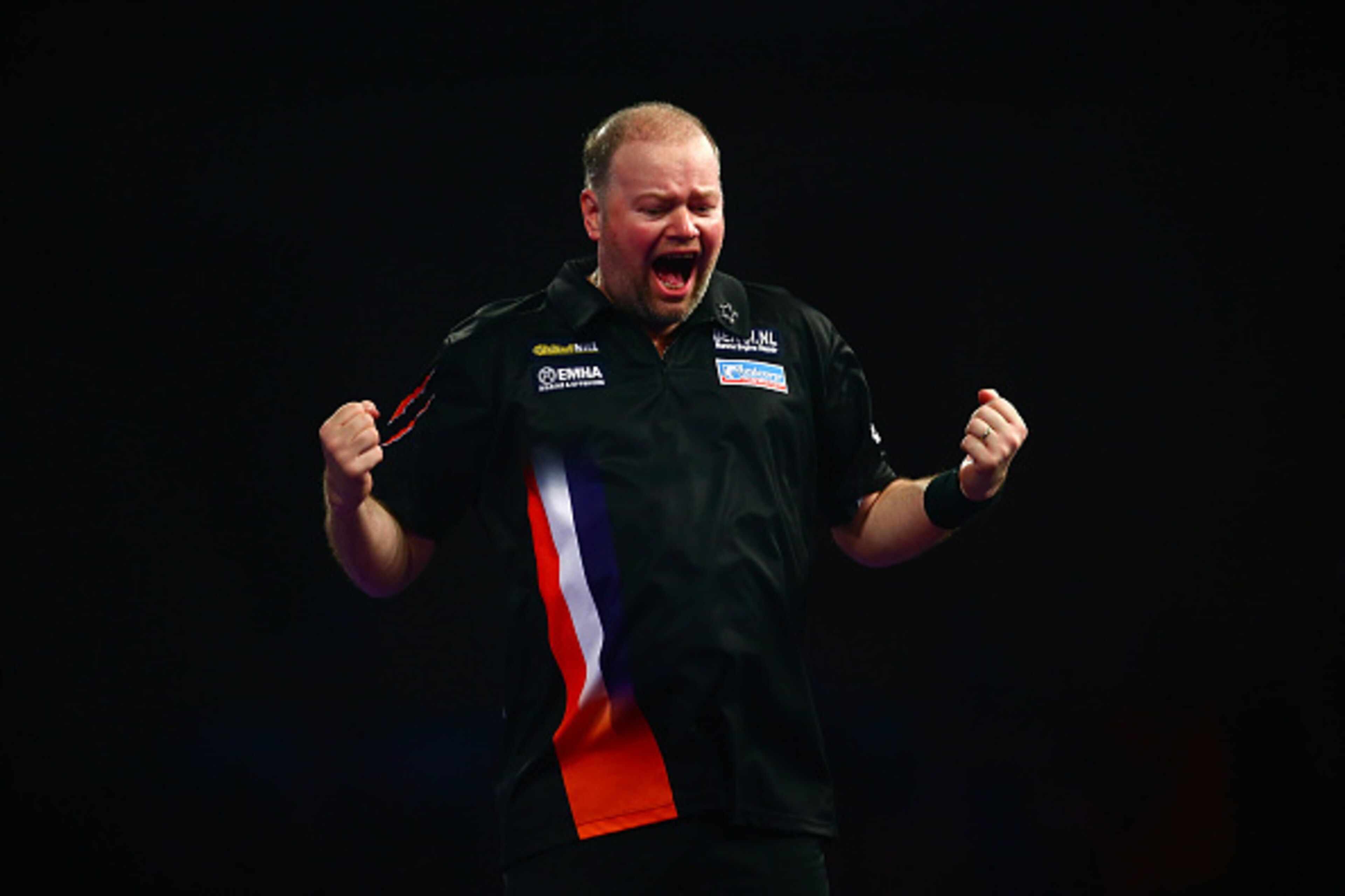 LONDON, ENGLAND - DECEMBER 29: Raymond van Barneveld of Holland celebrates a set point in his third round match against Michael van Gerwen of Holland on Day Eleven of the 2016 William Hill PDC World Darts Championships at Alexandra Palace on December 29, LONDON, ENGLAND - DECEMBER 29: Raymond van Barneveld of Holland celebrates a set point in his third round match against Michael van Gerwen of Holland on Day Eleven of the 2016 William Hill PDC World Darts Championships at Alexandra Palace on December 29,
