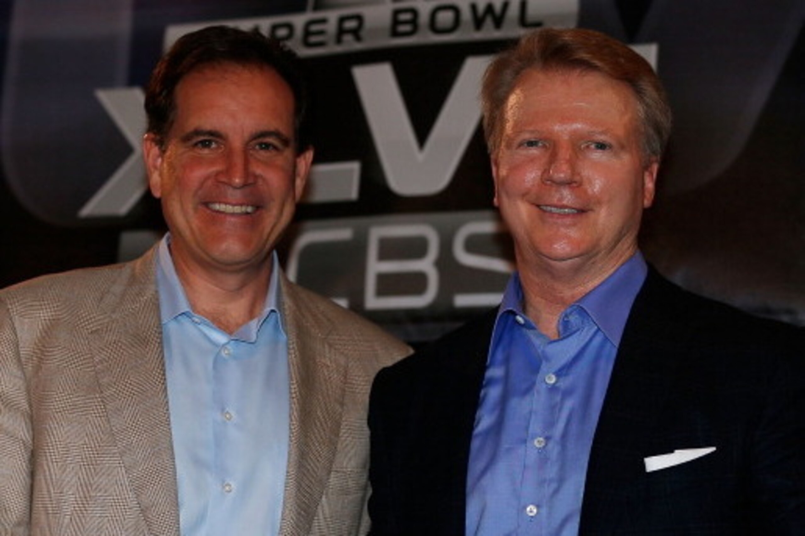 NEW ORLEANS, LA - JANUARY 29:  CBS Sports announcers Jim Nantz (L) and Phil Simms pose on stage at a CBS Super Bowl XLVII Broadcasters Press Conference at the New Orleans Convention Center on January 29, 2013 in New Orleans, Louisiana.  (Photo by Scott Ha