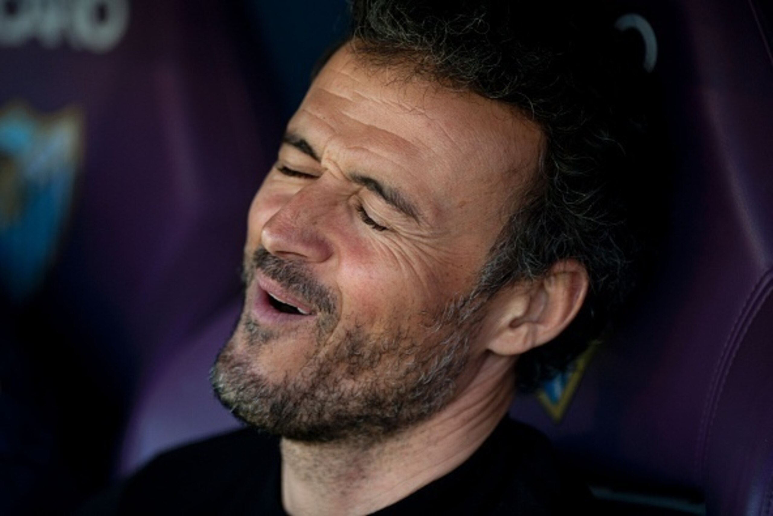 Barcelona's coach Luis Enrique Martinez grimaces before the Spanish league football match Malaga CF vs FC Barcelona at La Rosaleda stadium in Malaga on January 23, 2016.   AFP PHOTO / JORGE GUERRERO / AFP / Jorge Guerrero        (Photo credit should read 