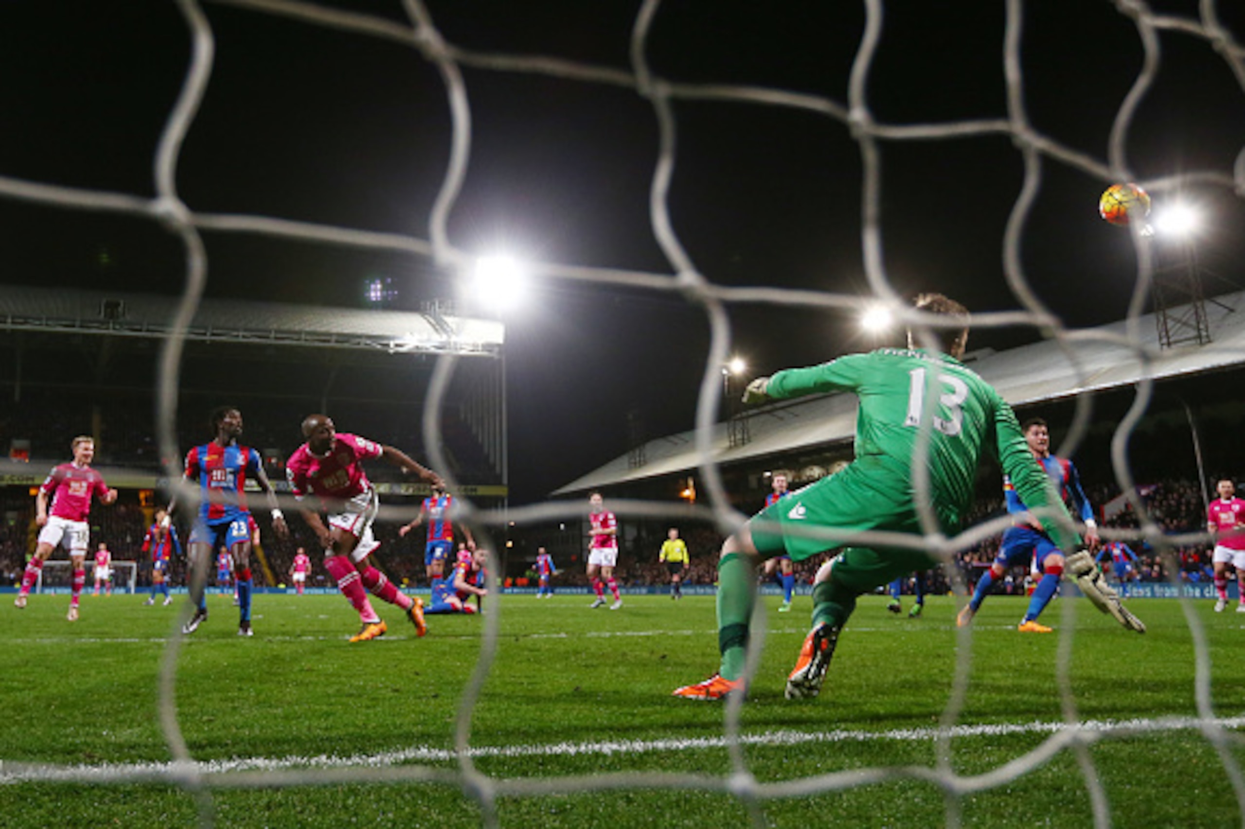 LONDON, ENGLAND - FEBRUARY 02:  Benik Afobe (3rd L) of Bournemouth heads the ball to score his team's second goal past Wayne Hennessey of Crystal Palace during the Barclays Premier League match between Crystal Palace and A.F.C. Bournemouth at Selhurst Par