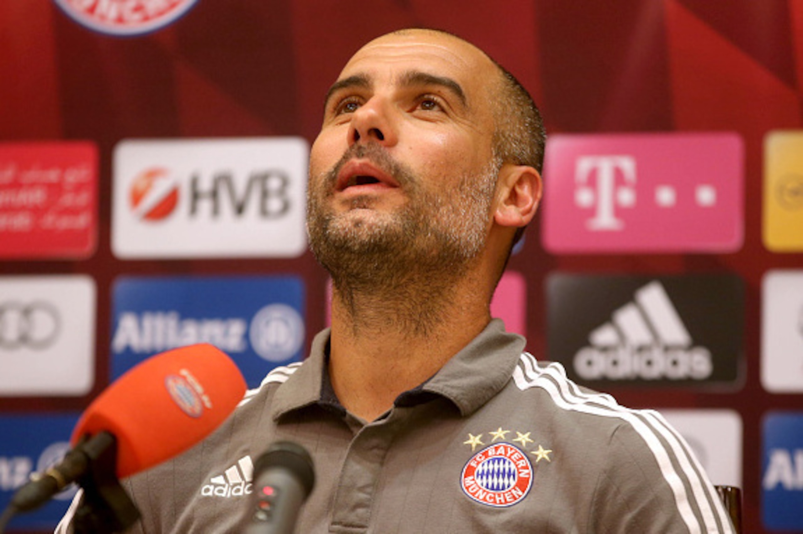 Bayern Munich's Spanish head coach Pep Guardiola speaks during a press conference at Aspire Academ in the Qatari capital Doha on January 11, 2016. / AFP / STRINGER        (Photo credit should read STRINGER/AFP/Getty Images)