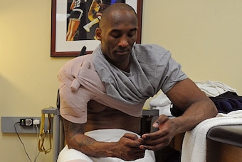 LOS ANGELES, CA - FEBRUARY 2:  Kobe Bryant #24 of the Los Angeles Lakers gets treatment after the game against the Minnesota Timberwolves on February 2, 2016 at STAPLES Center in Los Angeles, California. NOTE TO USER: User expressly acknowledges and agree