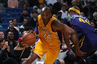 NEW ORLEANS, LA - FEBRUARY 4:  Kobe Bryant #24 of the Los Angeles Lakers handles the ball against the New Orleans Pelicans on February 4, 2016 at the Smoothie King Center in New Orleans, Louisiana. NOTE TO USER: User expressly acknowledges and agrees that