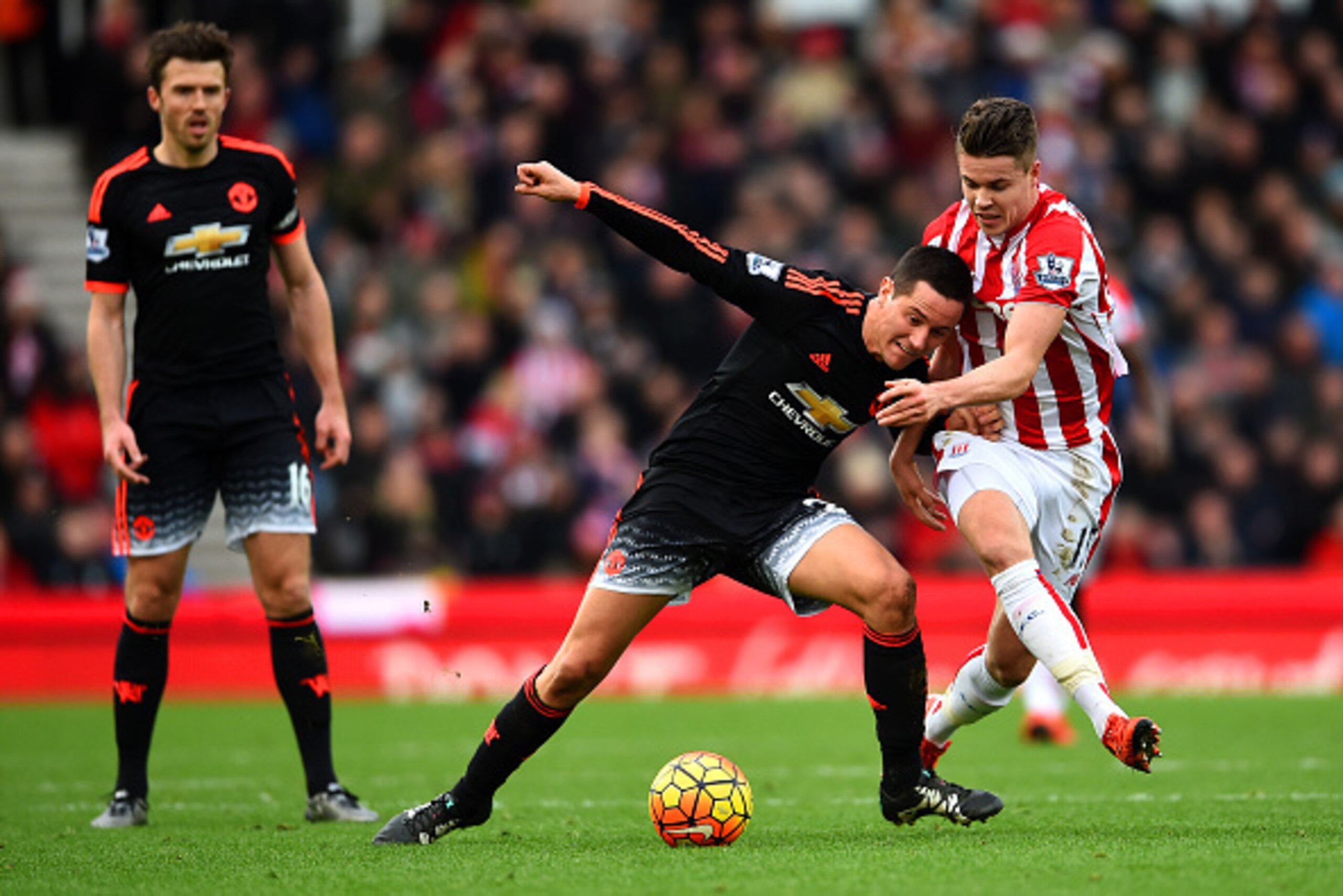 STOKE ON TRENT, ENGLAND - DECEMBER 26:  Marco van Ginkel of Stoke City battles for the ball with Ander Herrera of Manchester United during the Barclays Premier League match between Stoke City and Manchester United at Britannia Stadium on December 26, 2015