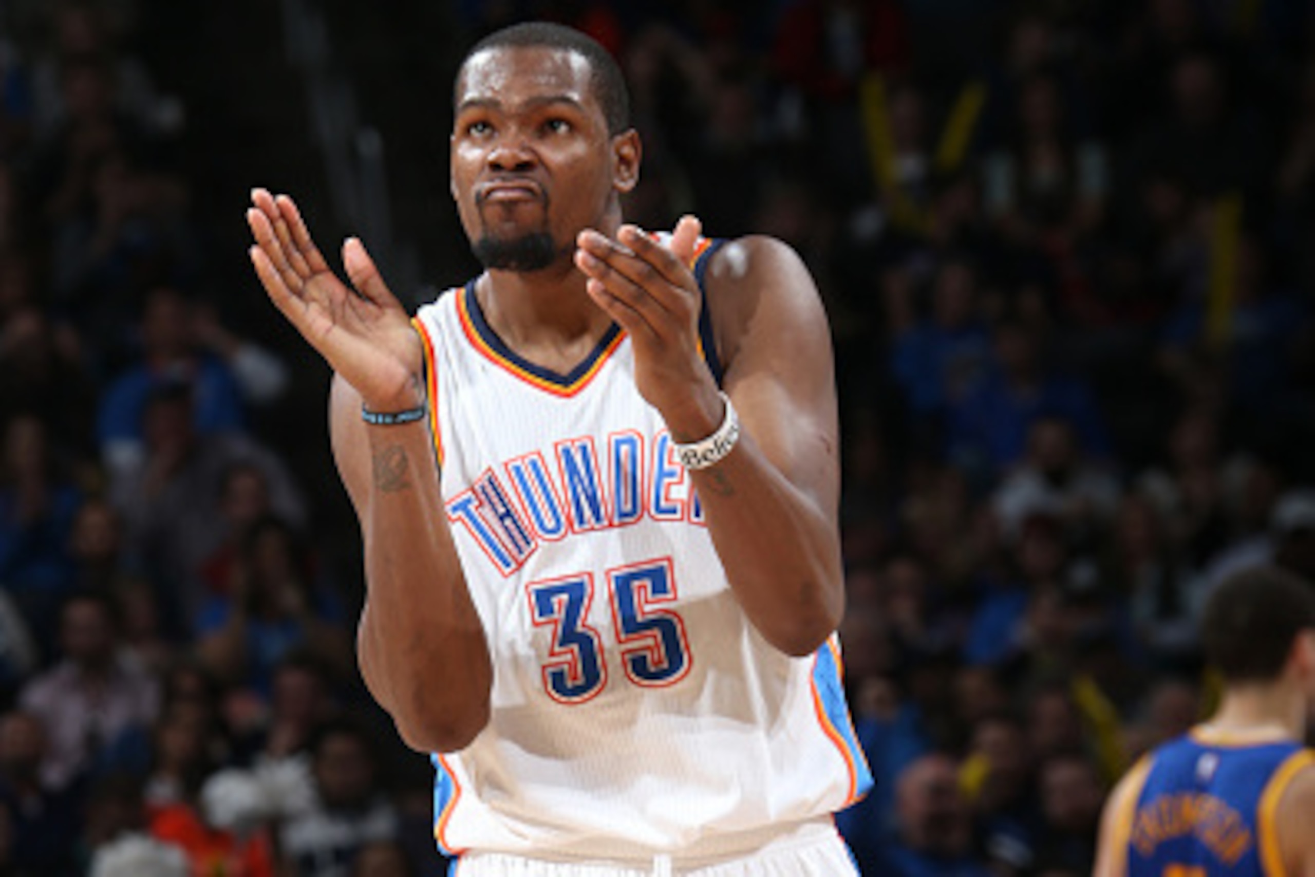 OKLAHOMA CITY, OK- JANUARY 16: Kevin Durant #35 of the Oklahoma City Thunder celebrates during a game against the Golden State Warriors on January 16, 2015 at Chesapeake Energy Arena in Oklahoma City, OK. NOTE TO USER: User expressly acknowledges and agre