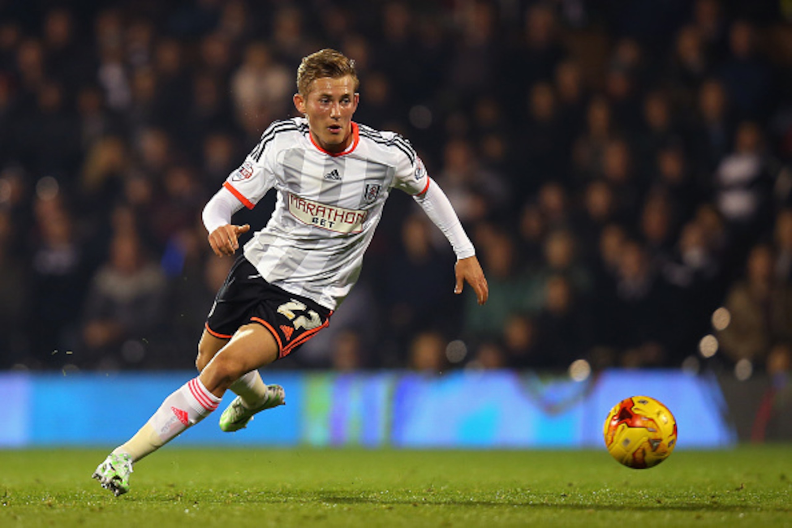LONDON, ENGLAND - NOVEMBER 05:  George Williams of Fulham in action during the Sky Bet Championship match between Fulham and Blackpool at Craven Cottage on November 5, 2014 in London, England.  (Photo by Bryn Lennon/Getty Images)