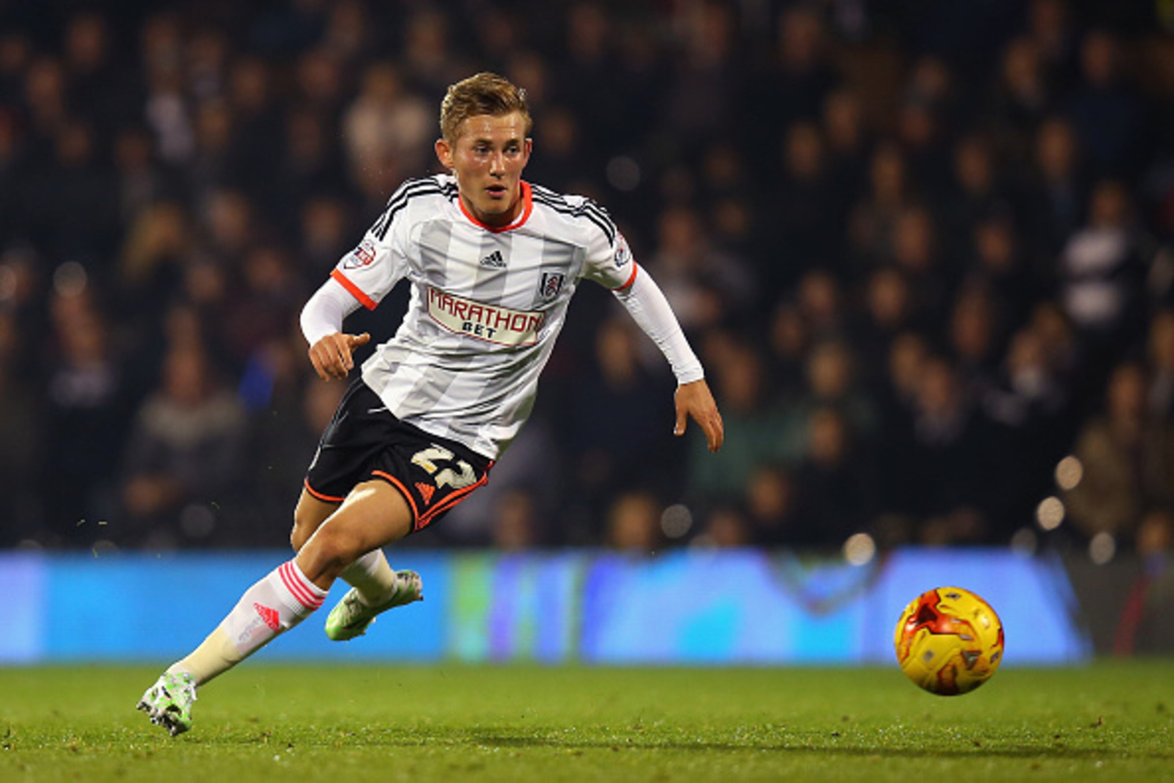 LONDON, ENGLAND - NOVEMBER 05:  George Williams of Fulham in action during the Sky Bet Championship match between Fulham and Blackpool at Craven Cottage on November 5, 2014 in London, England.  (Photo by Bryn Lennon/Getty Images)