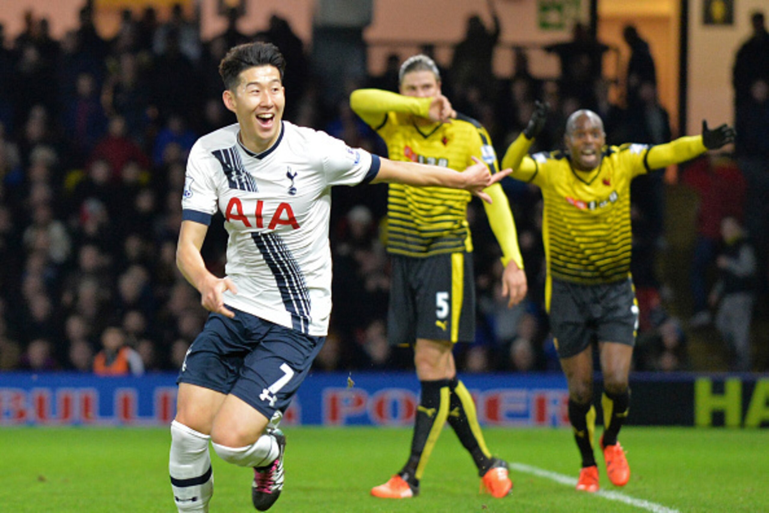 Tottenham Hotspur's South Korean striker Son Heung-Min (L) celebrates after scoring their late winning goal during the English Premier League football match between Watford and Tottenham Hotspur at Vicarage Road Stadium in Watford, north of London on Dece