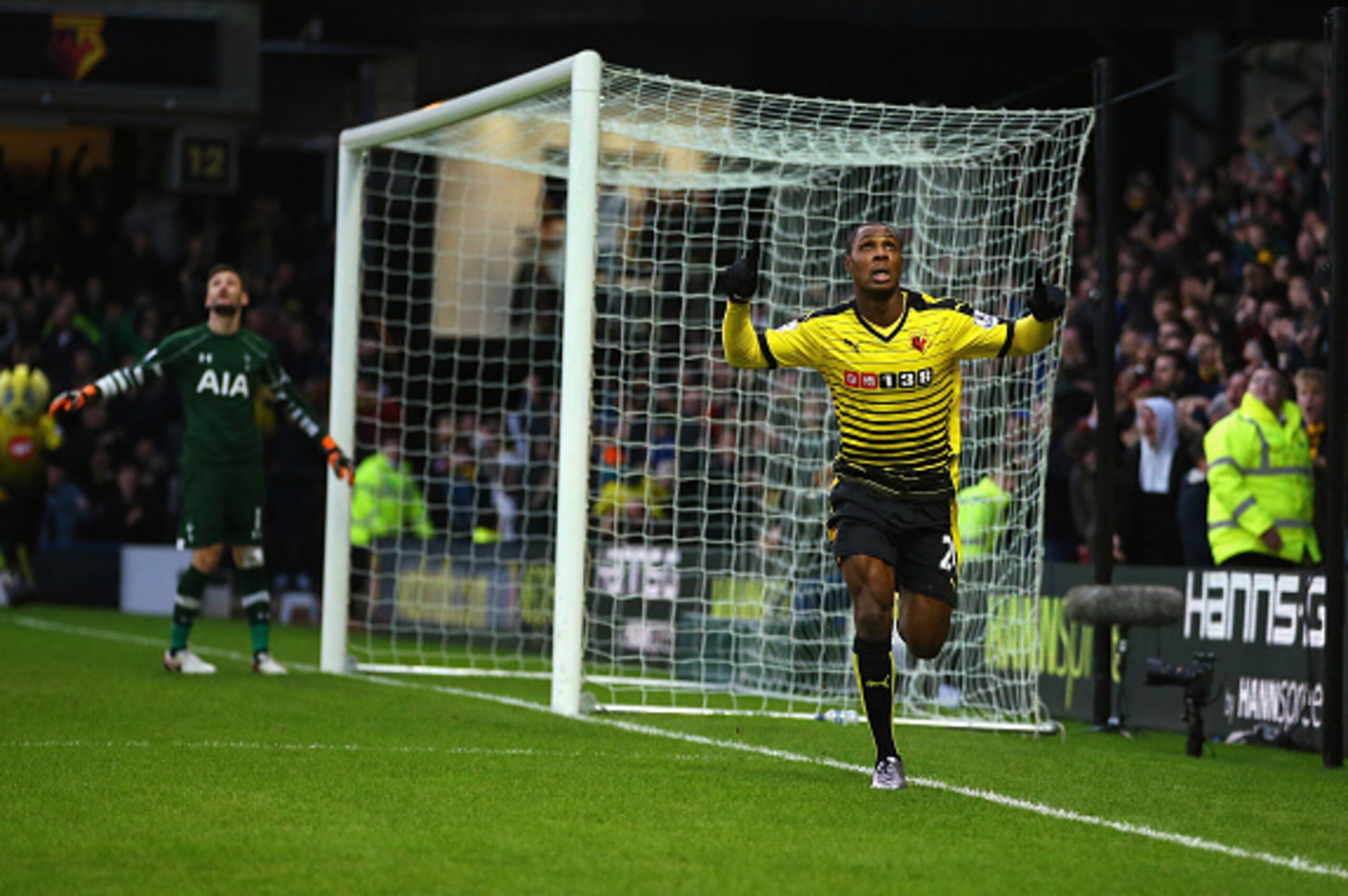 WATFORD, ENGLAND - DECEMBER 28:  Odion Ighalo (R) of Watford celebrates scoring his team's first goal during the Barclays Premier League match between Watford and Tottenham Hotspur at Vicarage Road on December 28, 2015 in Watford, England.  (Photo by Rich