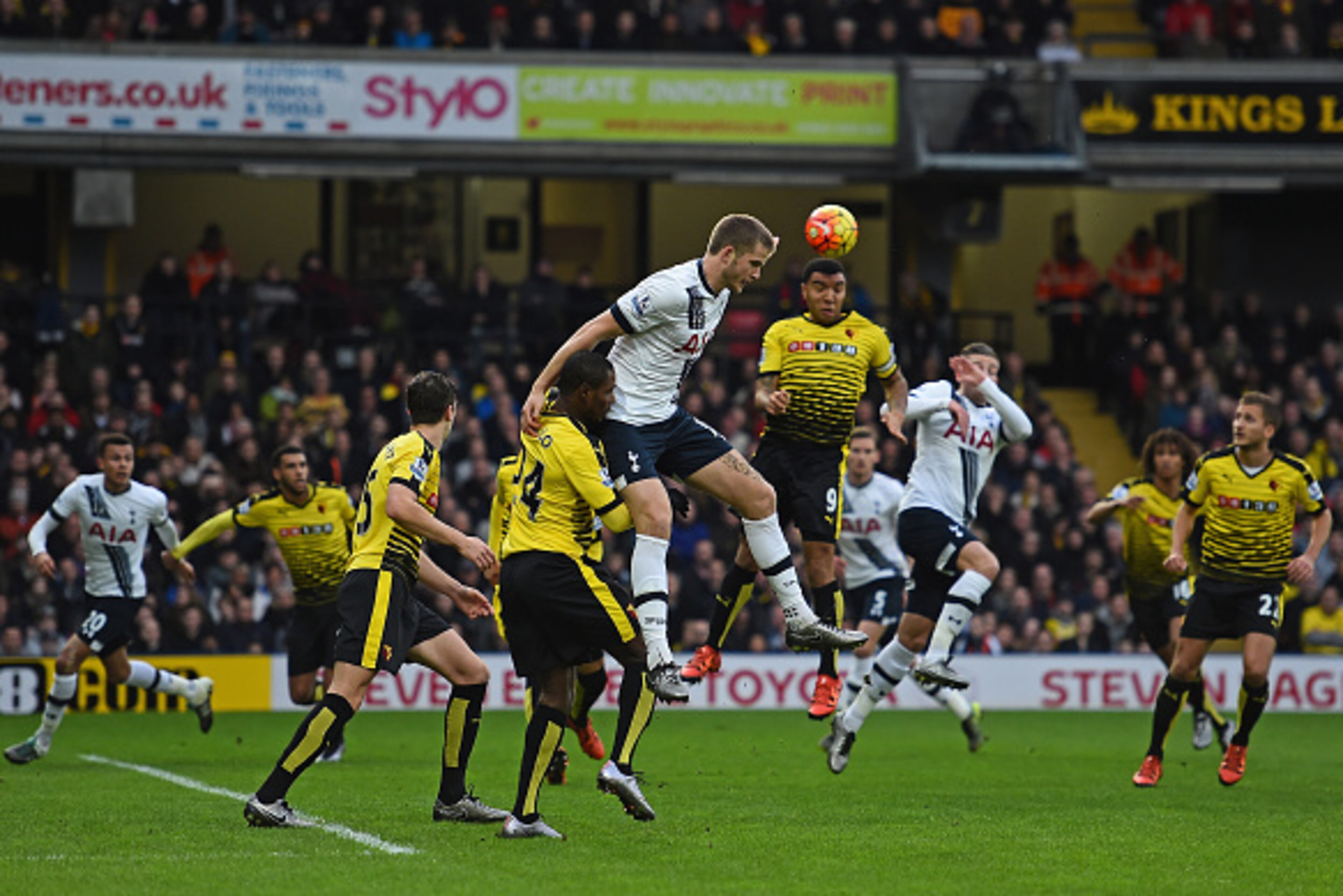 WATFORD, ENGLAND - DECEMBER 28: Troy Deeney of Watford and Eric Dier of Tottenham Hotspur compete for the ball during the Barclays Premier League match between Watford and Tottenham Hotspur at Vicarage Road on December 28, 2015 in Watford, England. (Phot WATFORD, ENGLAND - DECEMBER 28: Troy Deeney of Watford and Eric Dier of Tottenham Hotspur compete for the ball during the Barclays Premier League match between Watford and Tottenham Hotspur at Vicarage Road on December 28, 2015 in Watford, England. (Phot