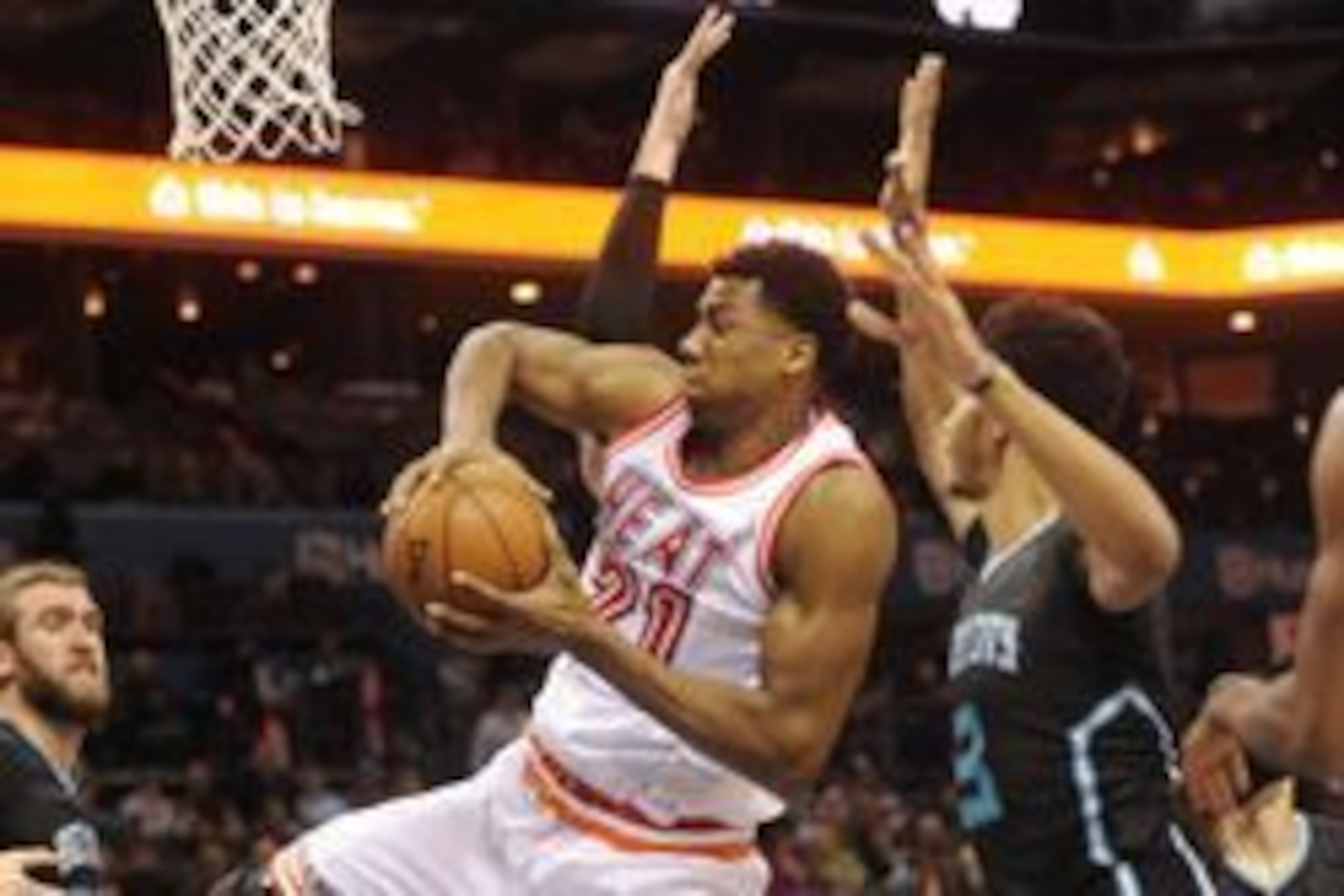 Feb 5, 2016; Charlotte, NC, USA; Miami Heat center Hassan Whiteside (21) fights Charlotte Hornets guard Jeremy Lamb (3) for a rebound during the first half of the game at Time Warner Cable Arena. Mandatory Credit: Sam Sharpe-USA TODAY Sports