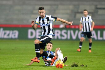 UDINE, ITALY - DECEMBER 02:  Bruno Fernandes Borges  (L) of Udinese Calcio is challenged to Alberto Grassi of Atalanta BC during the TIM Cup match between Udinese Calcio and Atalanta BC at Stadio Friuli on December 2, 2015 in Udine, Italy.  (Photo by Dino