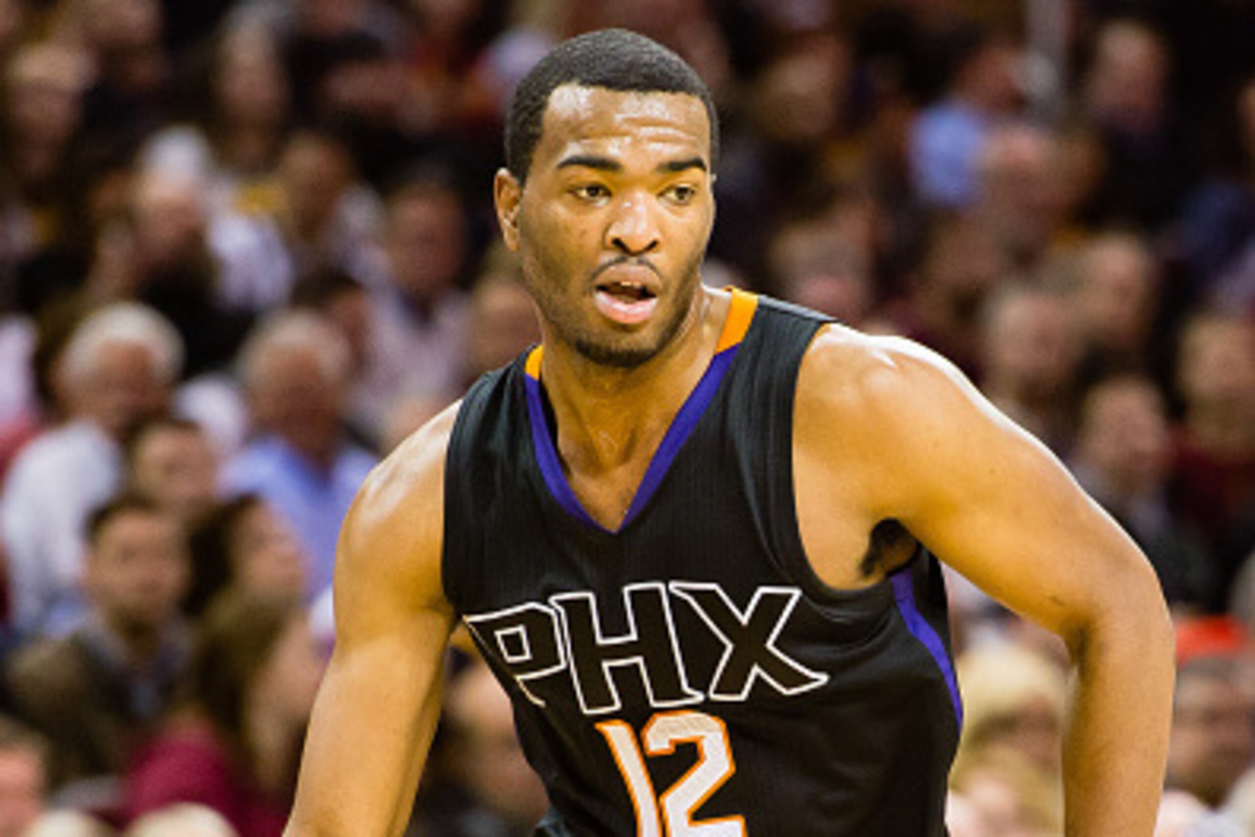CLEVELAND, OH - JANUARY 27: T.J. Warren #12 of the Phoenix Suns drives to the basket during the second half against the Cleveland Cavaliers at Quicken Loans Arena on January 27, 2016 in Cleveland, Ohio. The Cavaliers defeated the Suns 115-93. NOTE TO USER