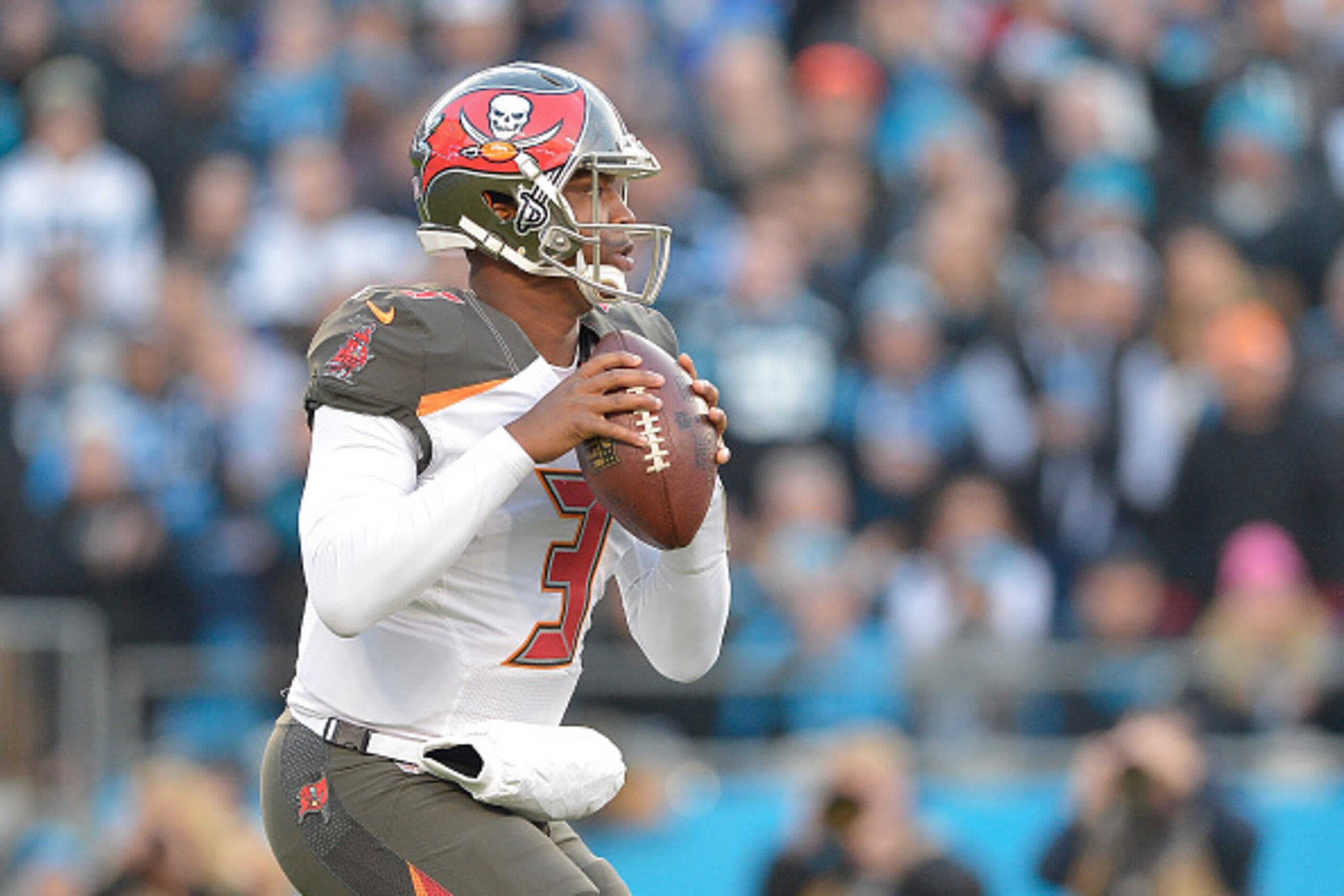 CHARLOTTE, NC - JANUARY 03: Jameis Winston #3 of the Tampa Bay Buccaneers in action against the Carolina Panther during their game at Bank of America Stadium on January 3, 2016 in Charlotte, North Carolina. The Panthers won 38-10 to clinch home field adv CHARLOTTE, NC - JANUARY 03: Jameis Winston #3 of the Tampa Bay Buccaneers in action against the Carolina Panther during their game at Bank of America Stadium on January 3, 2016 in Charlotte, North Carolina. The Panthers won 38-10 to clinch home field adv