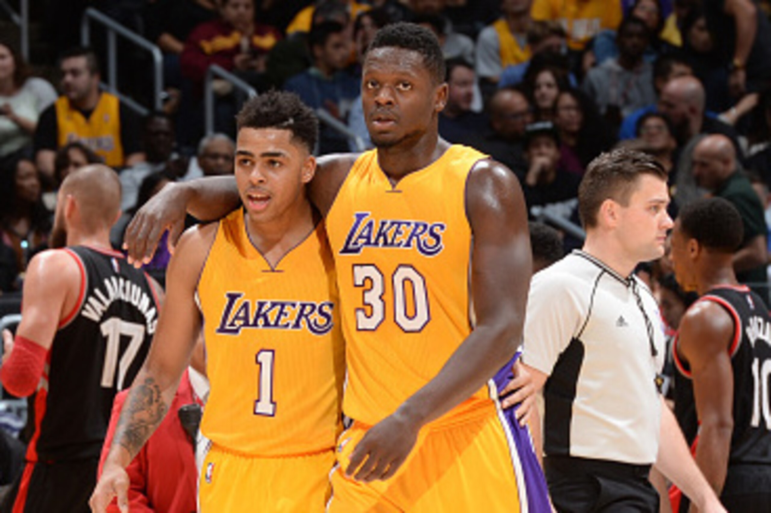 LOS ANGELES, CA - NOVEMBER 20:  Julius Randle #30 of the Los Angeles Lakers and D'Angelo Russell #1 of the Los Angeles Lakers talk during the game against the Toronto Raptors on November 20, 2015 at STAPLES Center in Los Angeles, California. NOTE TO USER: