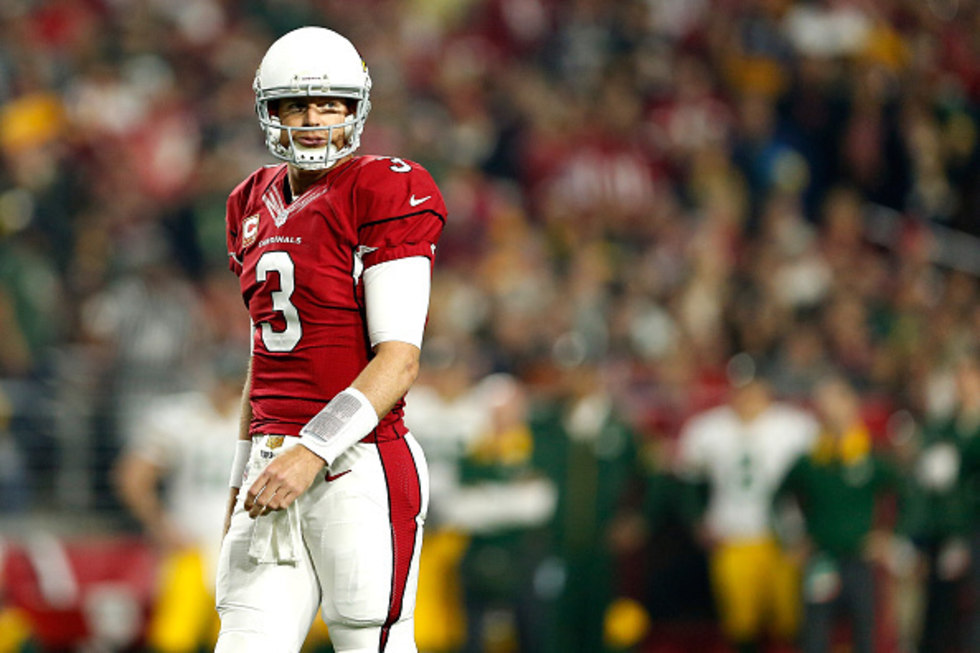 GLENDALE, AZ - JANUARY 16: Quarterback Carson Palmer #3 of the Arizona Cardinals looks to the sideline during the first half of the NFC Divisional Playoff Game against the Green Bay Packers at University of Phoenix Stadium on January 16, 2016 in Glendale,