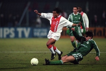 (L-R) Edgar Davids of Ajax, Spiros Marangos of Panathinaikos during the Champions League match between Ajax and Panathinaikos at the Olympic stadium on april 3, 1996 in Amsterdam, The Netherlands (Photo by VI Images via Getty Images)