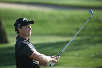 DUBAI, UNITED ARAB EMIRATES - FEBRUARY 06: Danny Willett of England plays his second shot on the 16th hole during the third round of the Omega Dubai Desert Classic at the Emirates Golf Club on February 6, 2016 in Dubai, United Arab Emirates.  (Photo by Wa