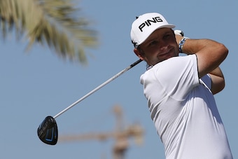Andy Sullivan of England plays a shot during the third round of the 2016 Dubai Desert Classic at the Emirates Golf Club in Dubai on February 6, 2016. / AFP / KARIM SAHIB        (Photo credit should read KARIM SAHIB/AFP/Getty Images)