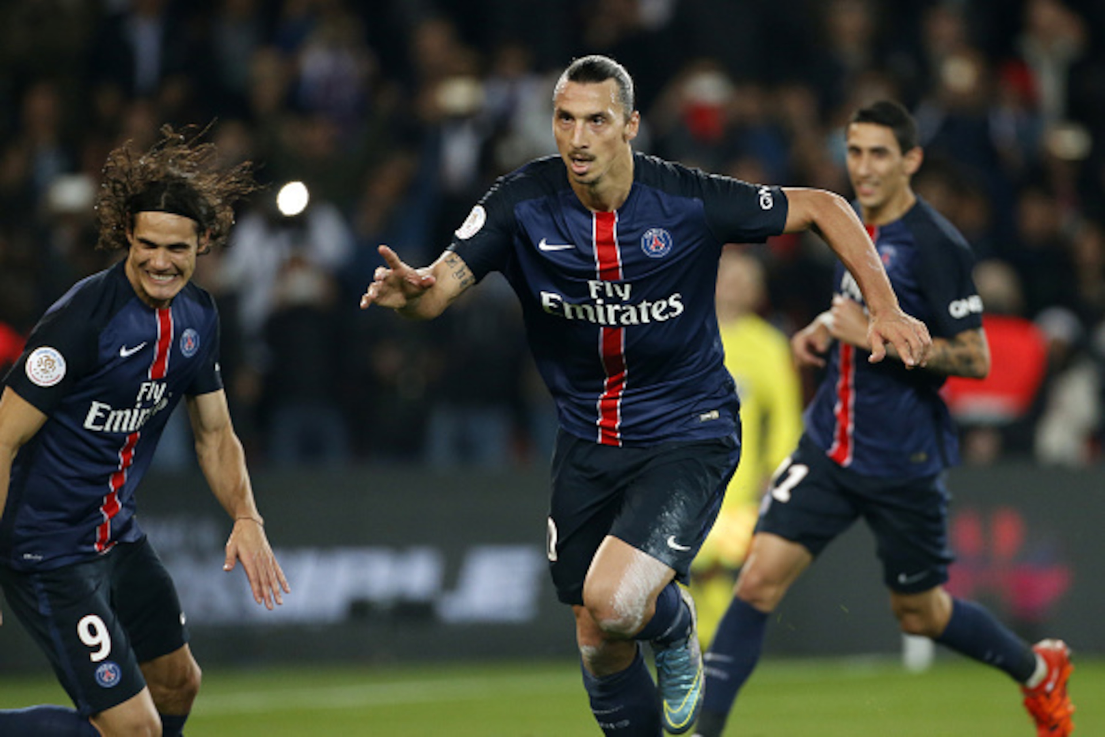 PARIS, FRANCE - OCTOBER 4: Zlatan Ibrahimovic of PSG celebrates scoring a goal during the French Ligue 1 match between Paris Saint-Germain FC (PSG) and Olympique de Marseille at Parc des Princes stadium on October 4, 2015 in Paris, France. (Photo by Jean 