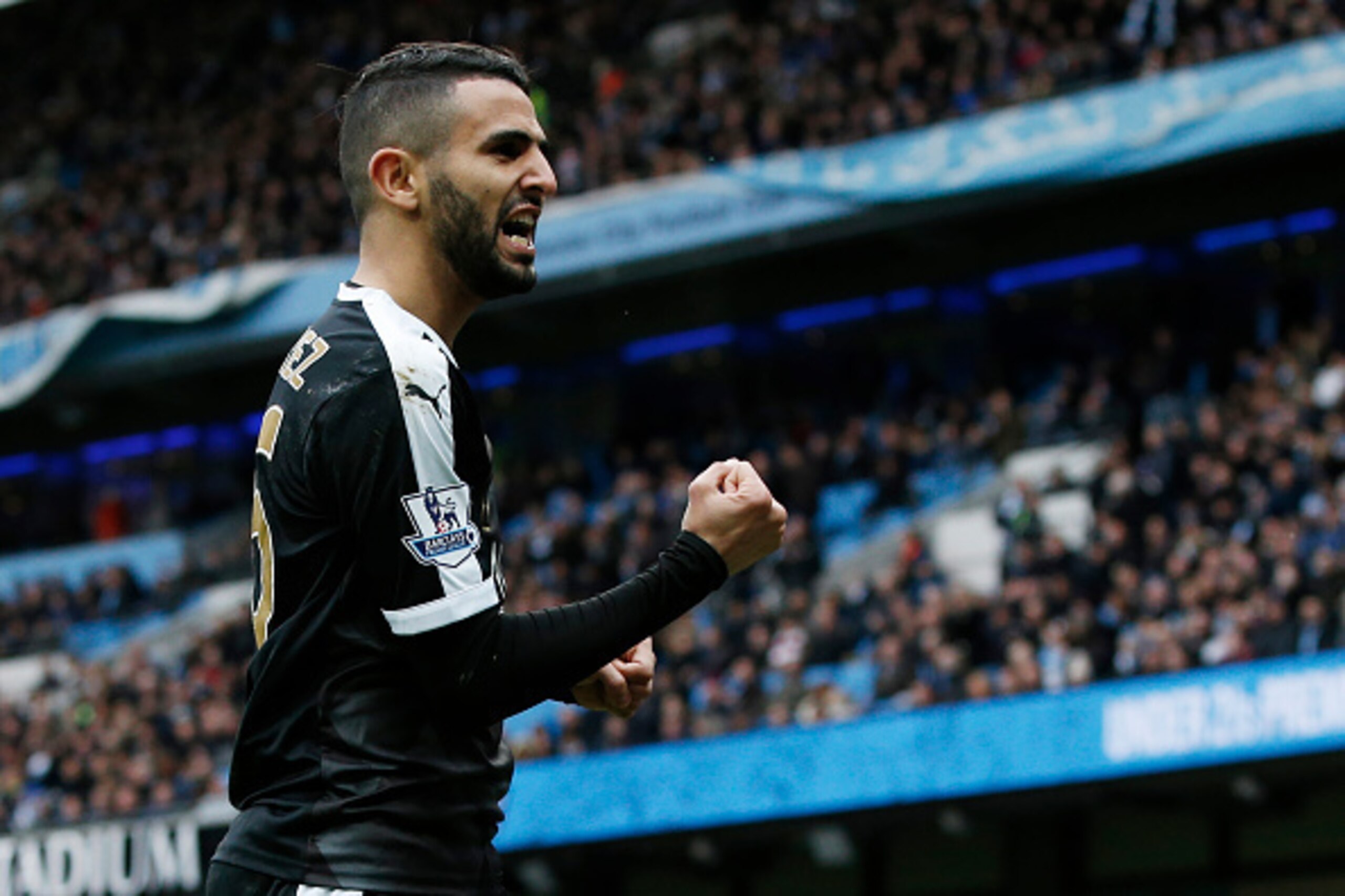 Leicester City's Algerian midfielder Riyad Mahrez celebrates  after scoring his team's second goal during the English Premier League football match between Manchester City and Leicester City at the Etihad Stadium in Manchester, north west England, on Febr
