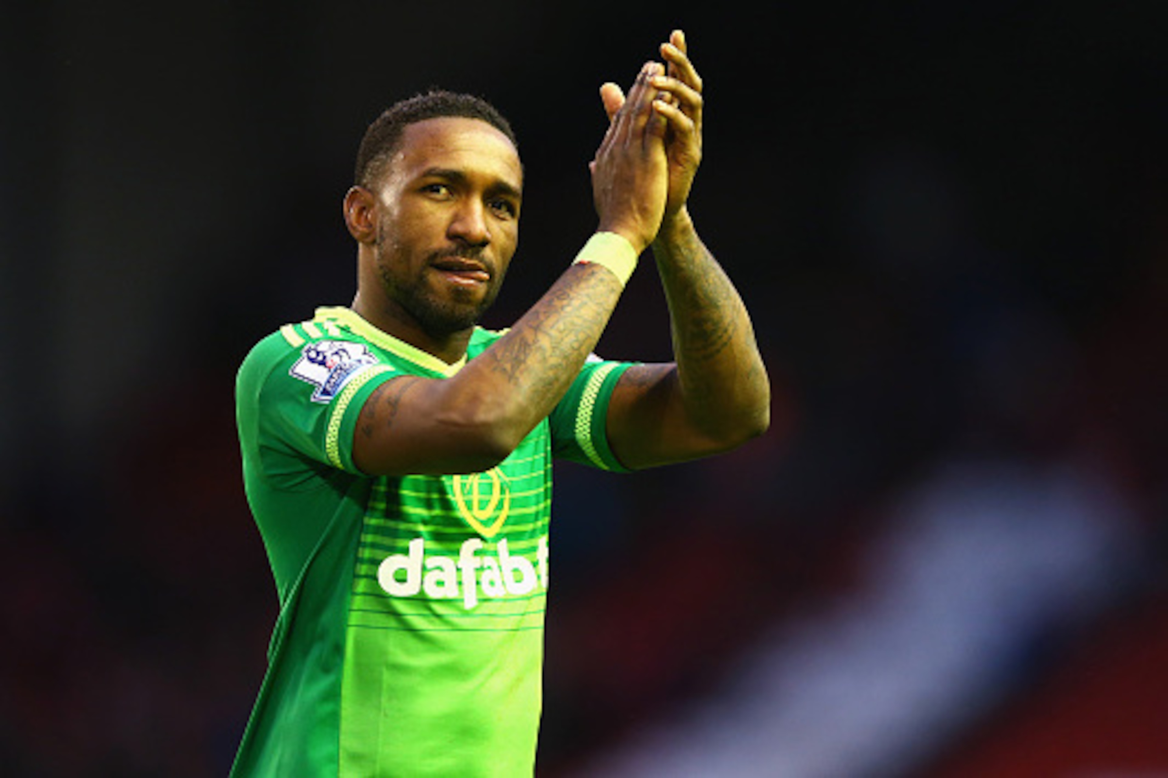 LIVERPOOL, ENGLAND - FEBRUARY 06:  Jermain Defoe of Sunderland applauds away supporters after the 2-2 draw in the Barclays Premier League match between Liverpool and Sunderland at Anfield on February 6, 2016 in Liverpool, England.  (Photo by Clive Brunski