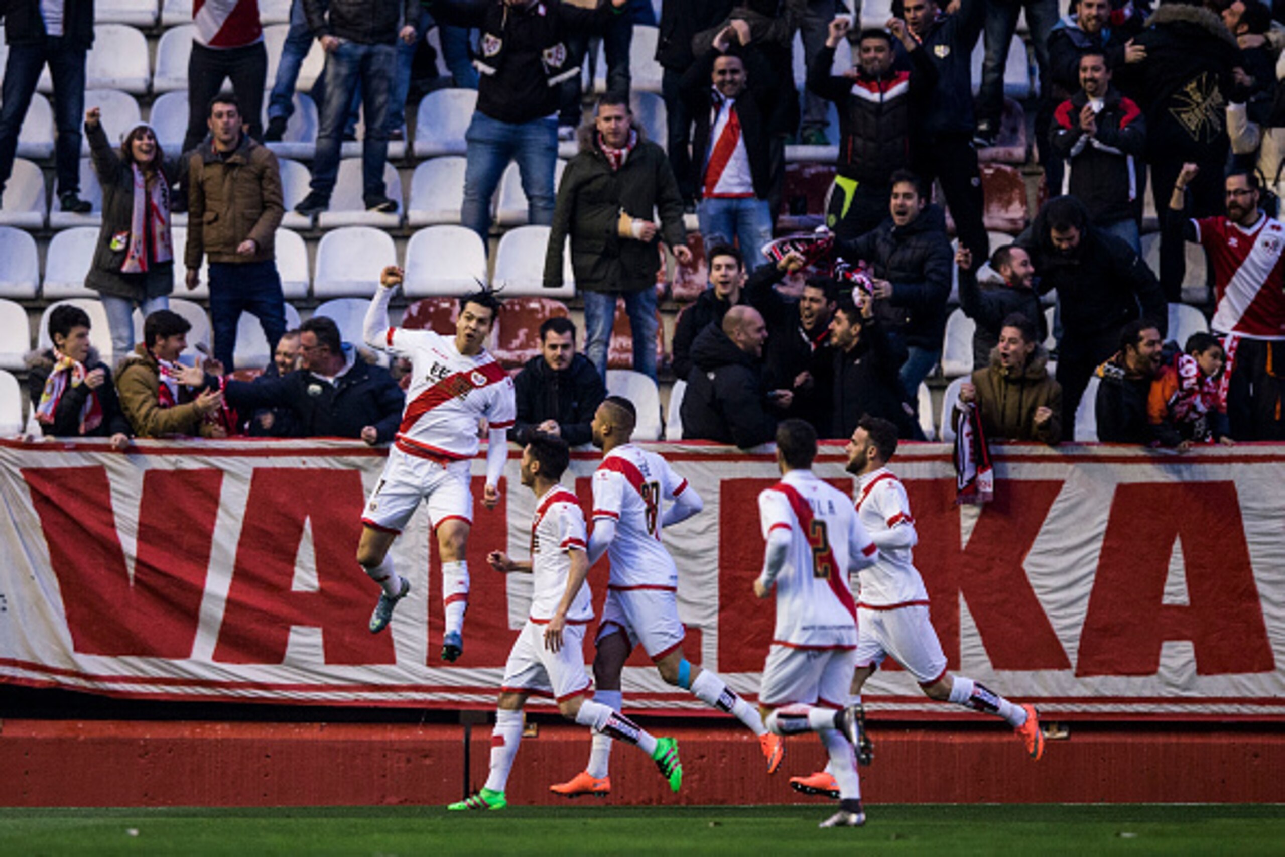 MADRID, SPAIN - FEBRUARY 06: Nicolas Fedor Flores alias Miku (L) of Rayo Vallecano de Madrid celebrates scoring their opening goal during the La Liga match between Rayo Vallecano de Madrid and UD Las Palmas  at Estadio de Vallecas on February 6, 2016 in M