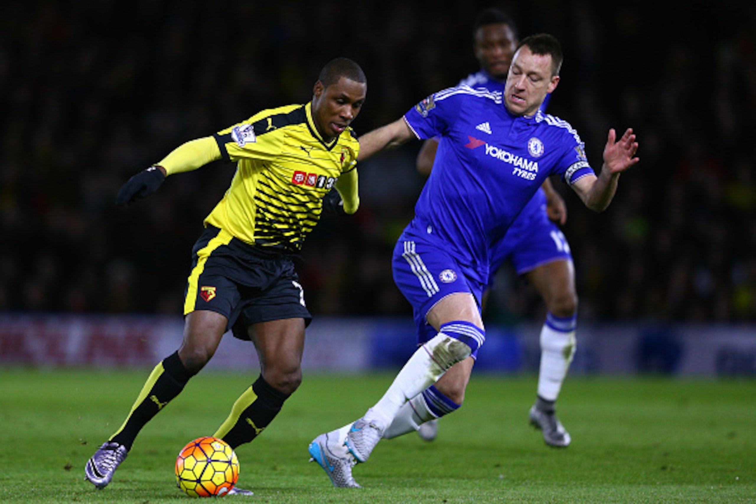 WATFORD, ENGLAND - FEBRUARY 03:  Odion Ighalo of Watford is challenged by John Terry of Chelsea during the Barclays Premier League match between Watford and Chelsea at Vicarage Road on February 3, 2016 in Watford, England.  (Photo by Clive Mason/Getty Ima
