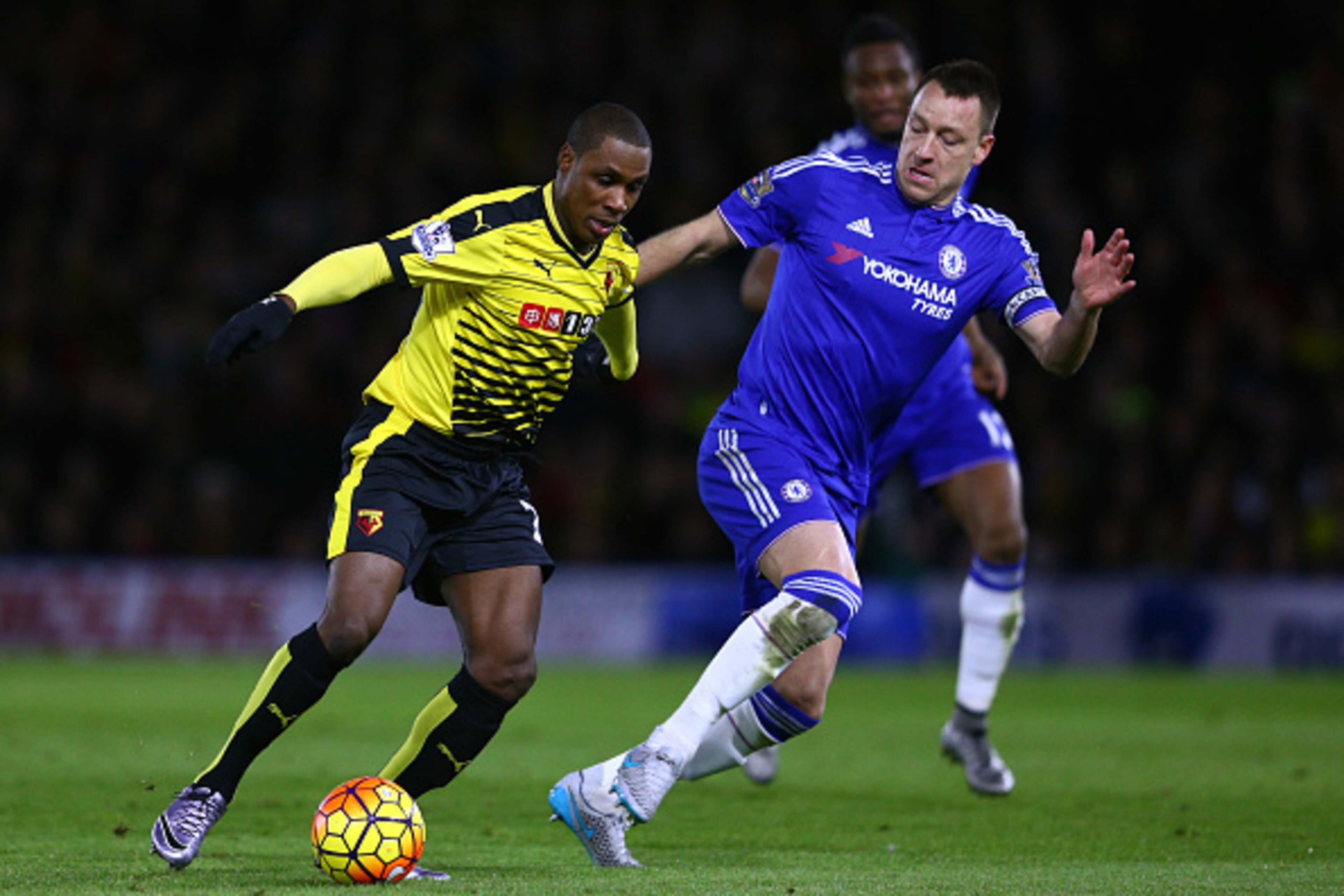 WATFORD, ENGLAND - FEBRUARY 03:  Odion Ighalo of Watford is challenged by John Terry of Chelsea during the Barclays Premier League match between Watford and Chelsea at Vicarage Road on February 3, 2016 in Watford, England.  (Photo by Clive Mason/Getty Ima