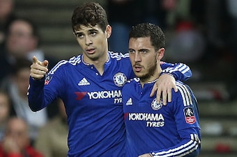MILTON KEYNES, ENGLAND - JANUARY 31: Oscar of Chelsea celebrates with team mate Eden Hazard after scoring his and his sides third goal during The Emirates FA Cup Fourth Round match between Milton Keynes Dons and Chelsea at Stadium mk on January 31, 2016 i