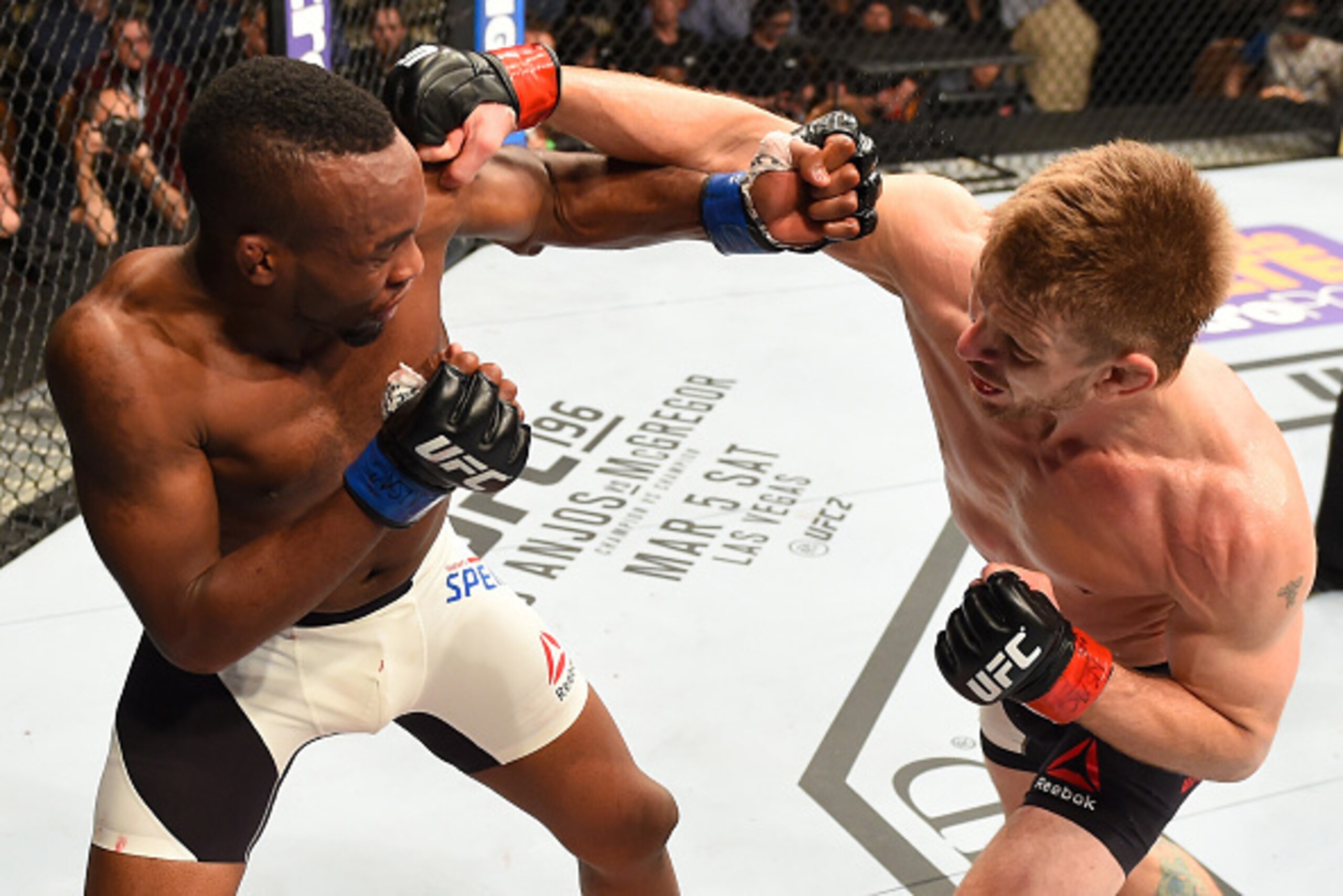 LAS VEGAS, NV - FEBRUARY 06:  (L-R) Sean Spencer and Mike Pyle fight in their welterweight bout during the UFC Fight Night event at MGM Grand Garden Arena on February 6, 2016 in Las Vegas, Nevada.  (Photo by Josh Hedges/Zuffa LLC/Zuffa LLC via Getty Image