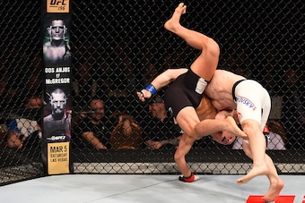 LAS VEGAS, NV - FEBRUARY 06:  (L-R) Joseph Benavidez fights Zach Makovsky in their flyweight bout during the UFC Fight Night event at MGM Grand Garden Arena on February 6, 2016 in Las Vegas, Nevada.  (Photo by Josh Hedges/Zuffa LLC/Zuffa LLC via Getty Ima
