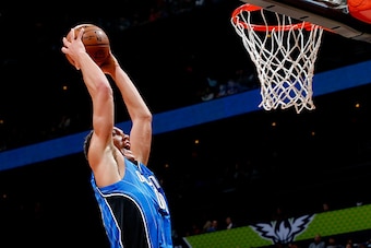ATLANTA, GA - JANUARY 18:  Aaron Gordon #00 of the Orlando Magic dunks against the Atlanta Hawks at Philips Arena on January 18, 2016 in Atlanta, Georgia.  NOTE TO USER User expressly acknowledges and agrees that, by downloading and or using this photogra